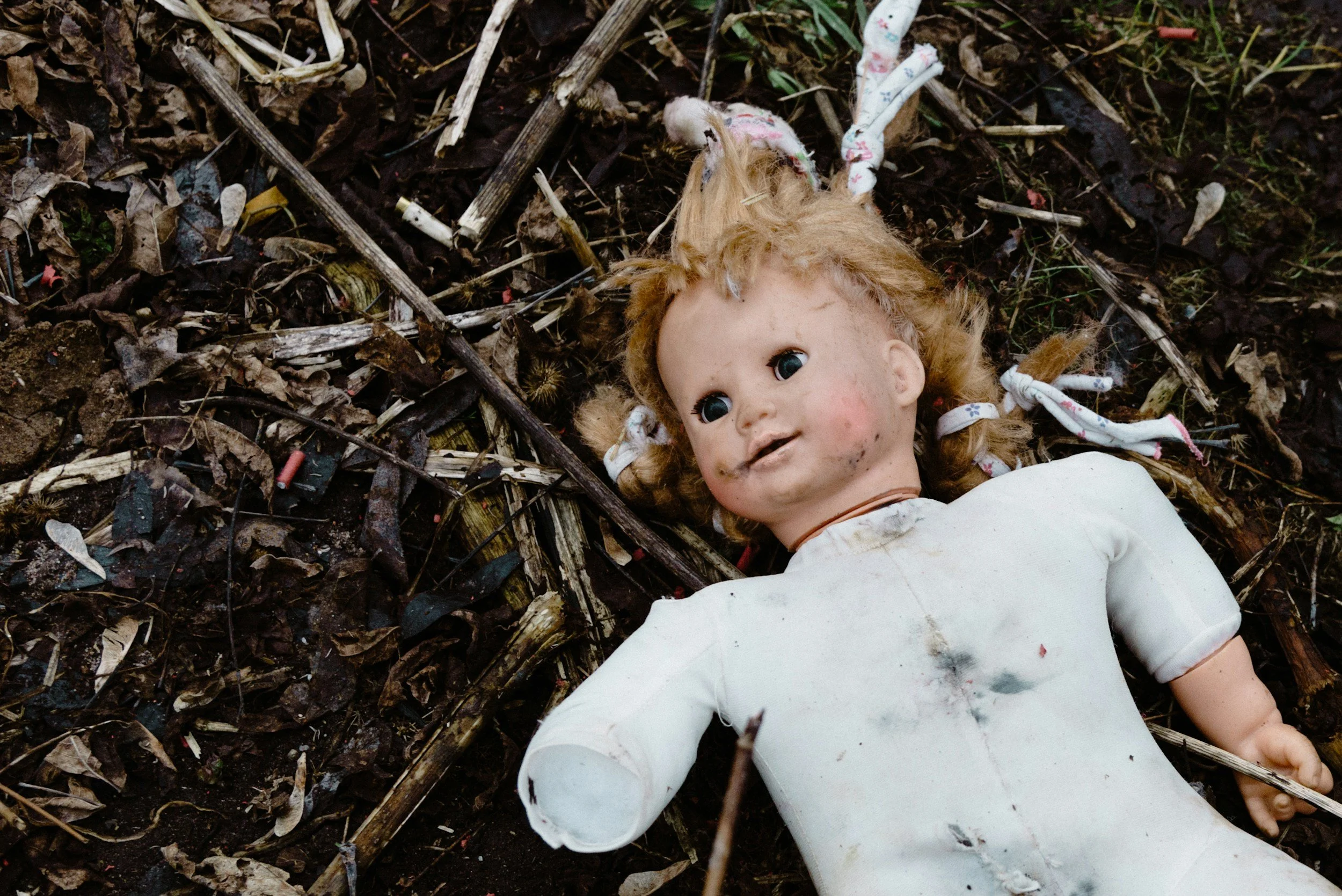 A dirty, dismembered doll.