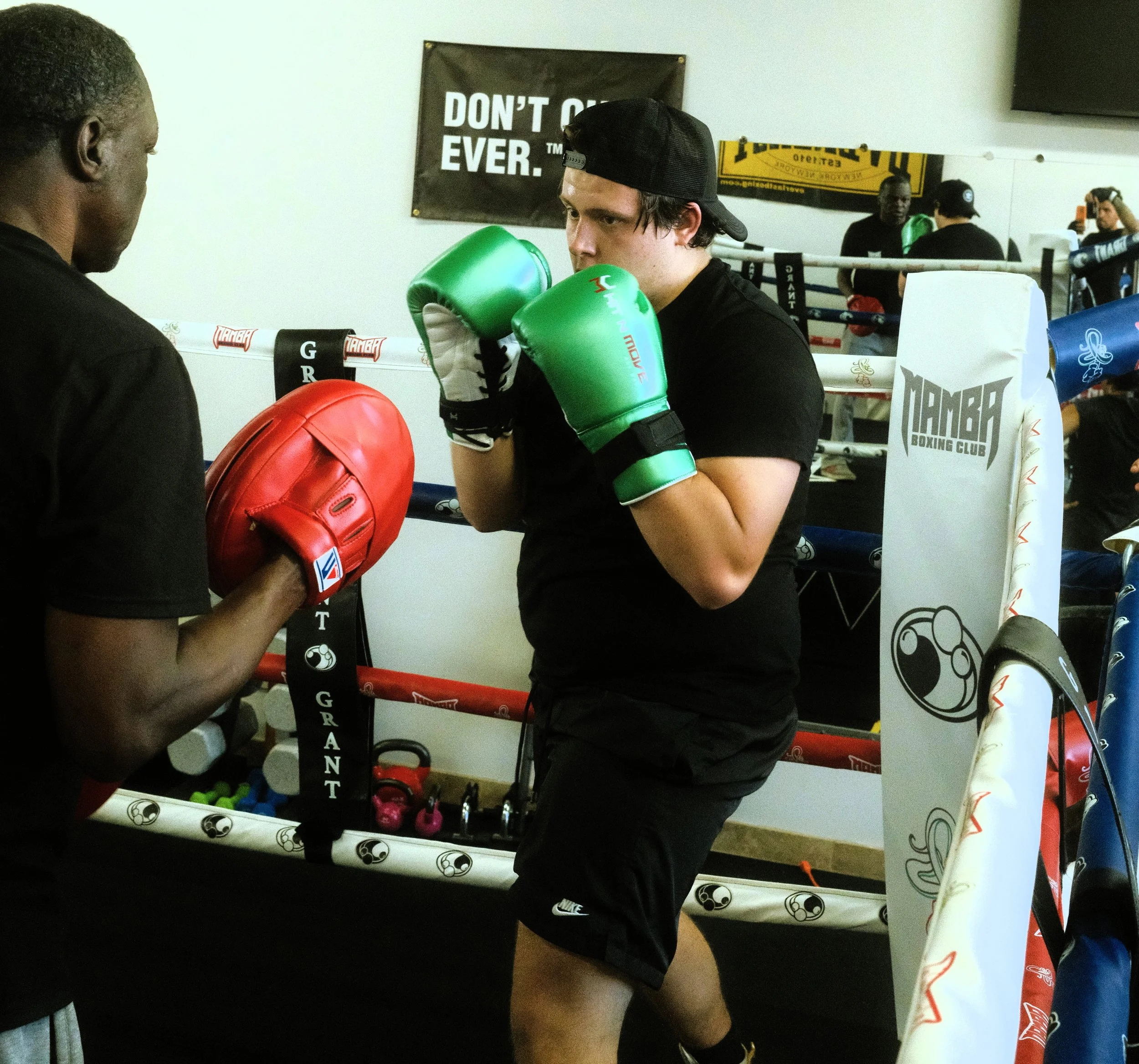 Pad work directly taught from the Mayweather style.