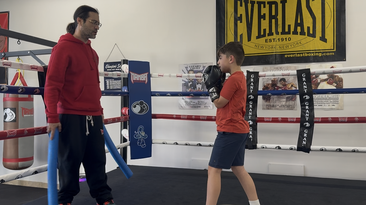 Fun boxing lesson with coach.
