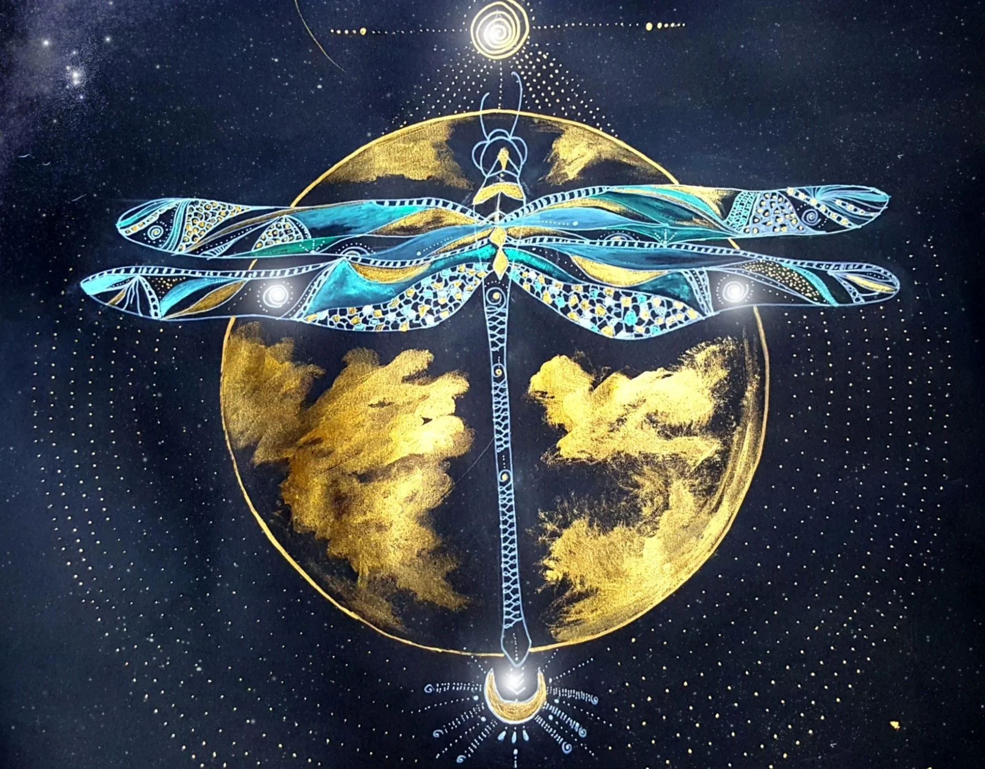A colorful, stylized dragonfly with intricate patterns in blue, gold, and white. The background features a dark sky with stars and a large golden circle resembling a moon, with the dragonfly appearing to be flying over it.