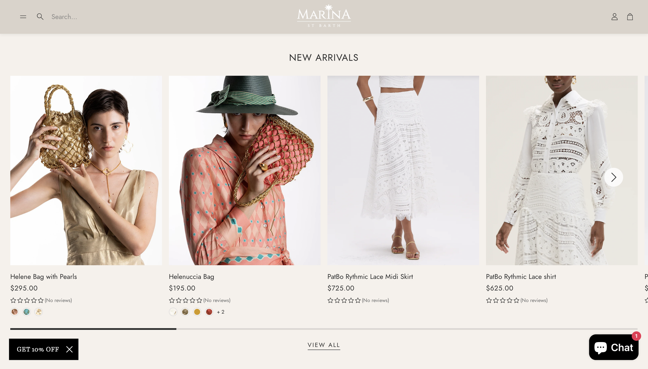 Online boutique website displaying new arrivals including gold handbag, pink patterned blouse with green hat, white lace midi skirt, and white lace shirt, with prices and star ratings.