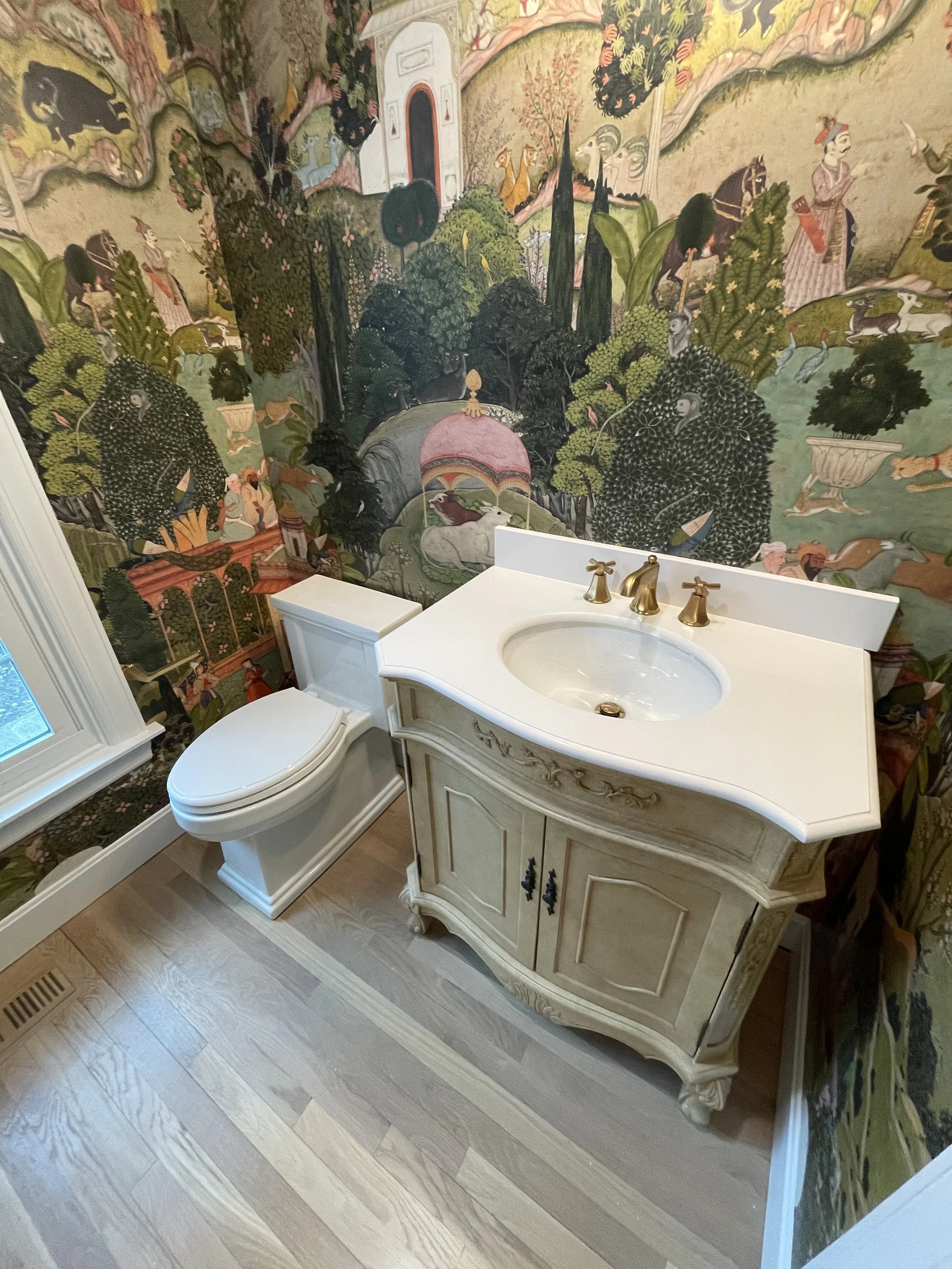 Counter mounted sink with gold faucet