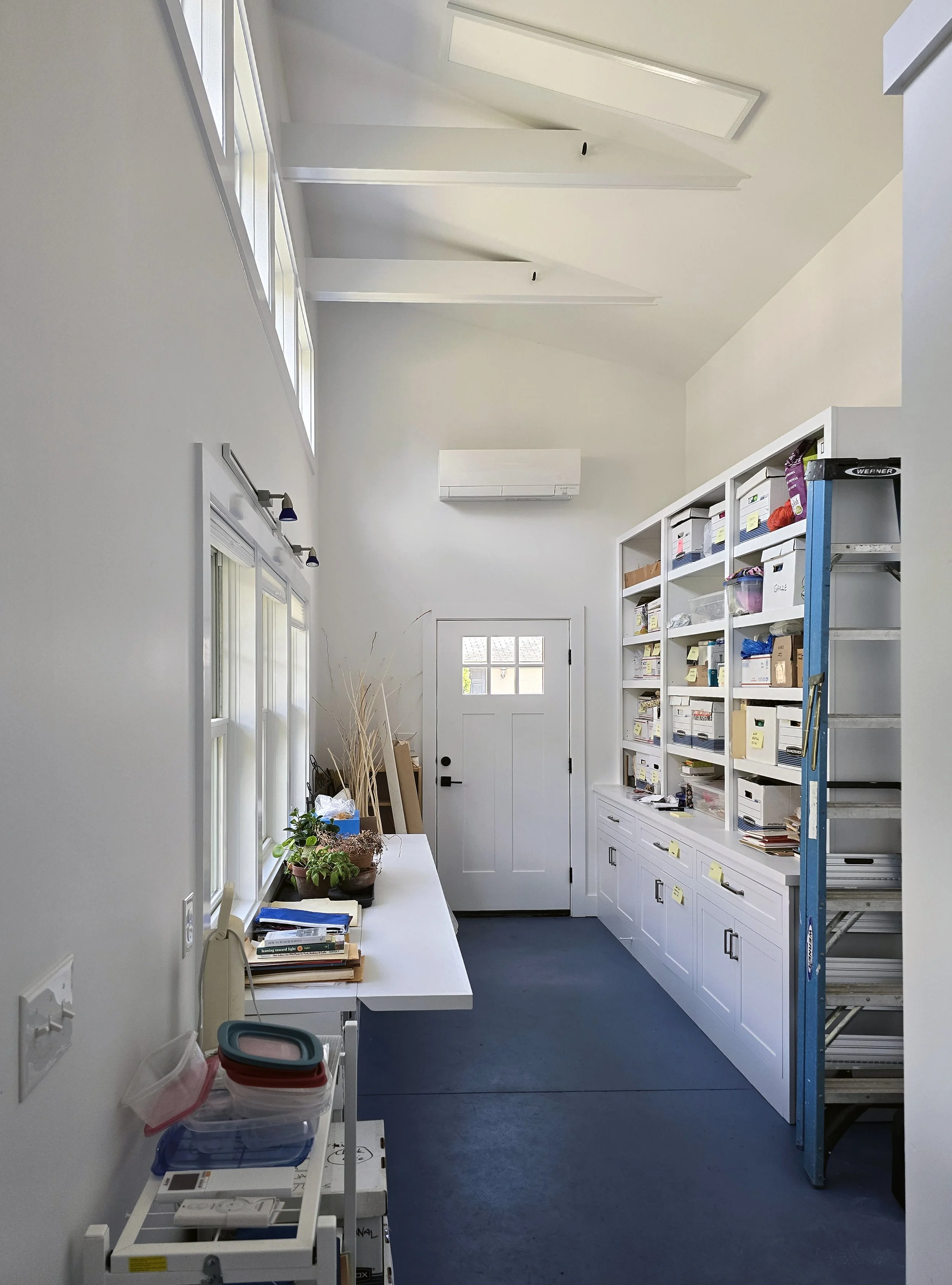 artist studio, built-in shelving, clerestory windows