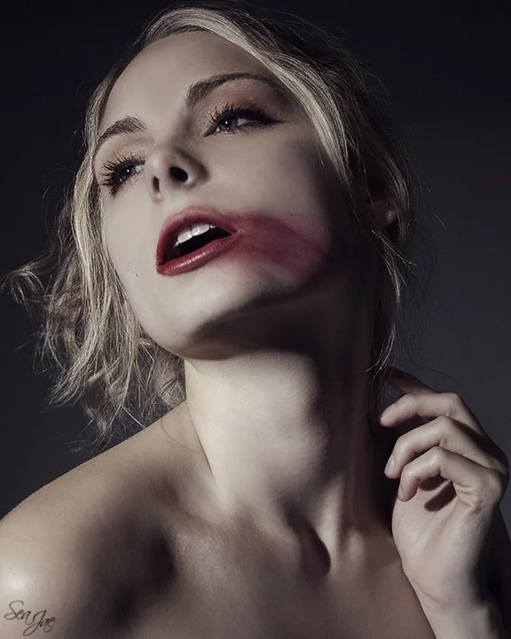 blonde woman lipstick smear long neck