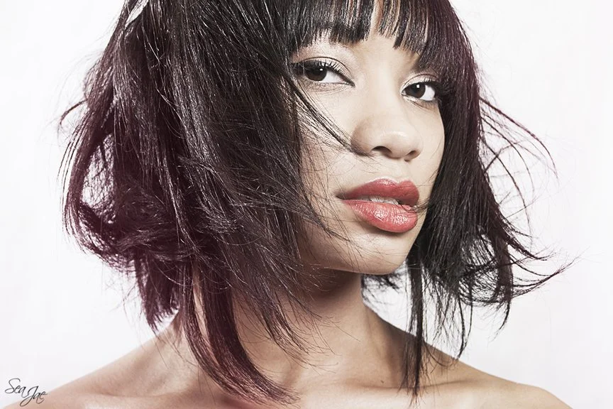 beautiful woman full lips short bob hair