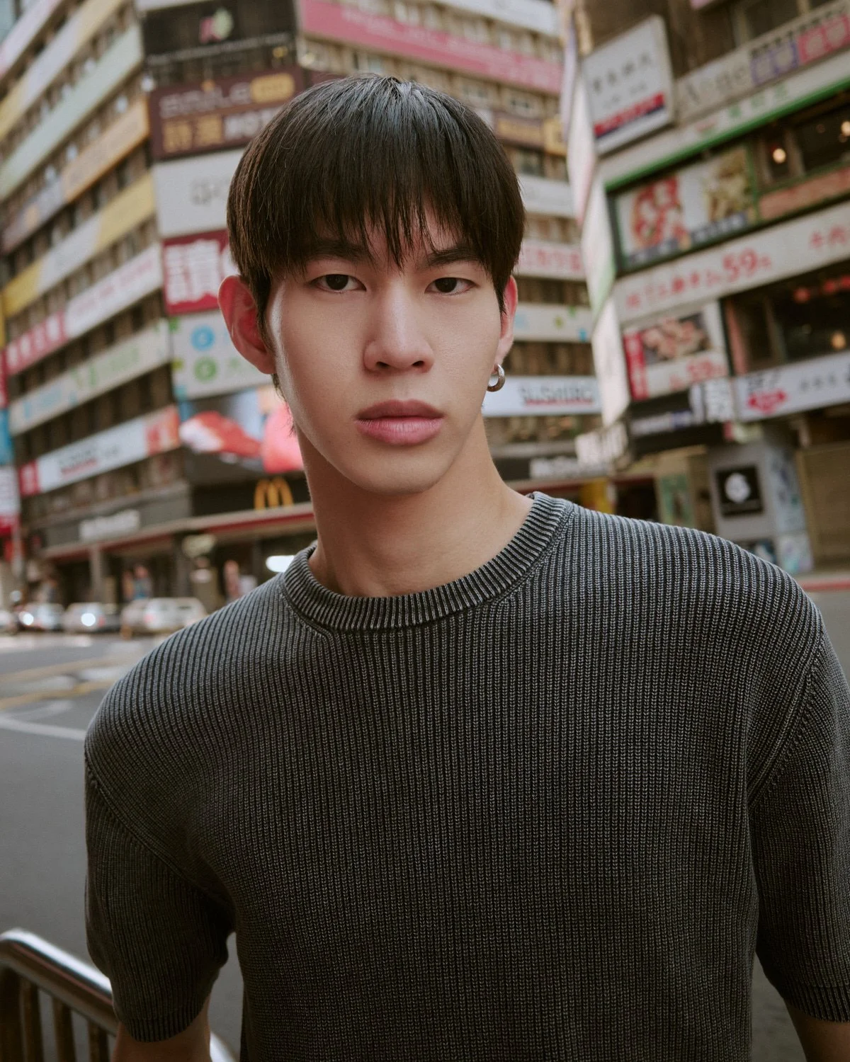 Close-up fashion portrait of a male model in the streets of Taipei photographed by Pedro Márnez