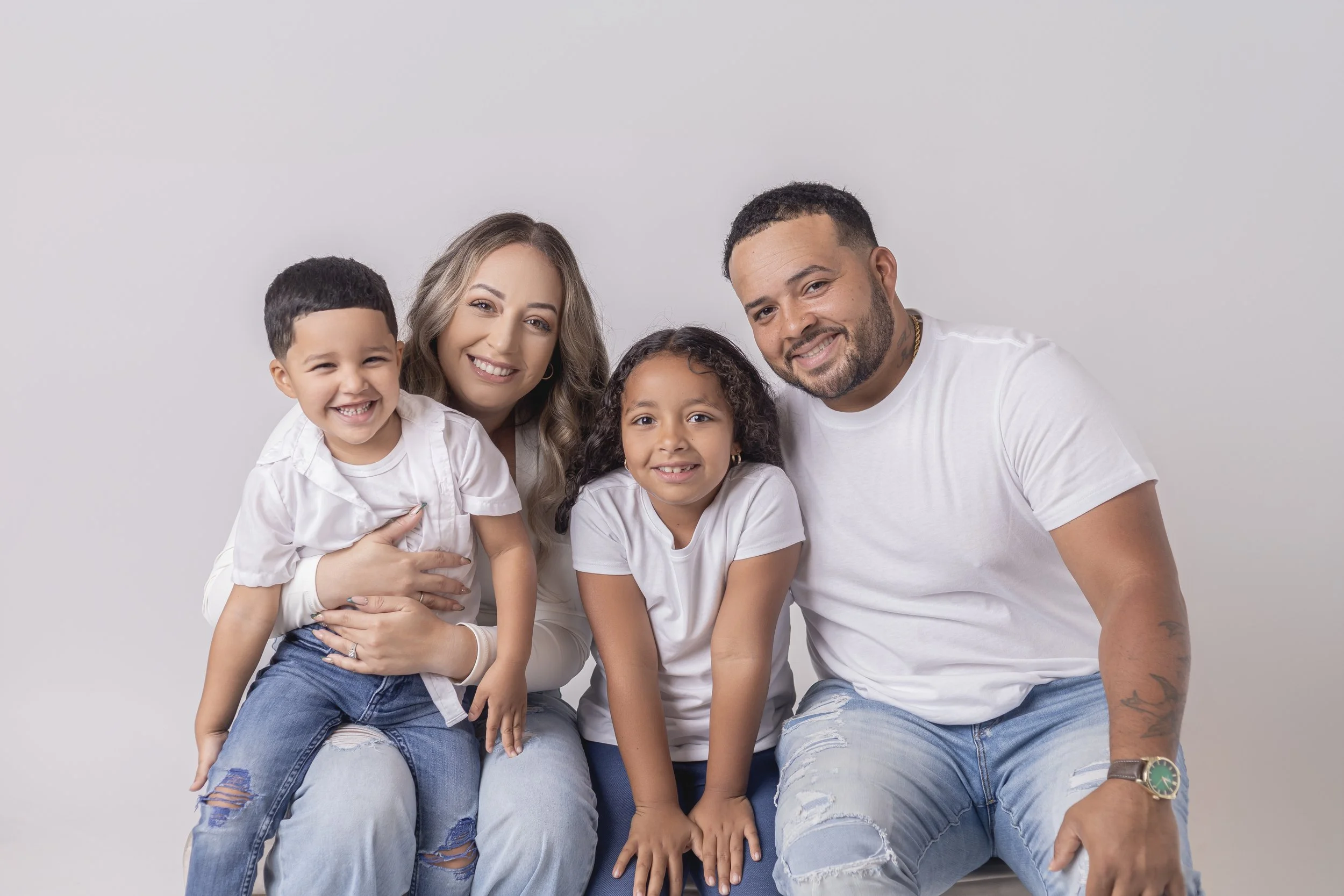 Michelle Figueroa, founder of A Rose's Thorn, with her family.