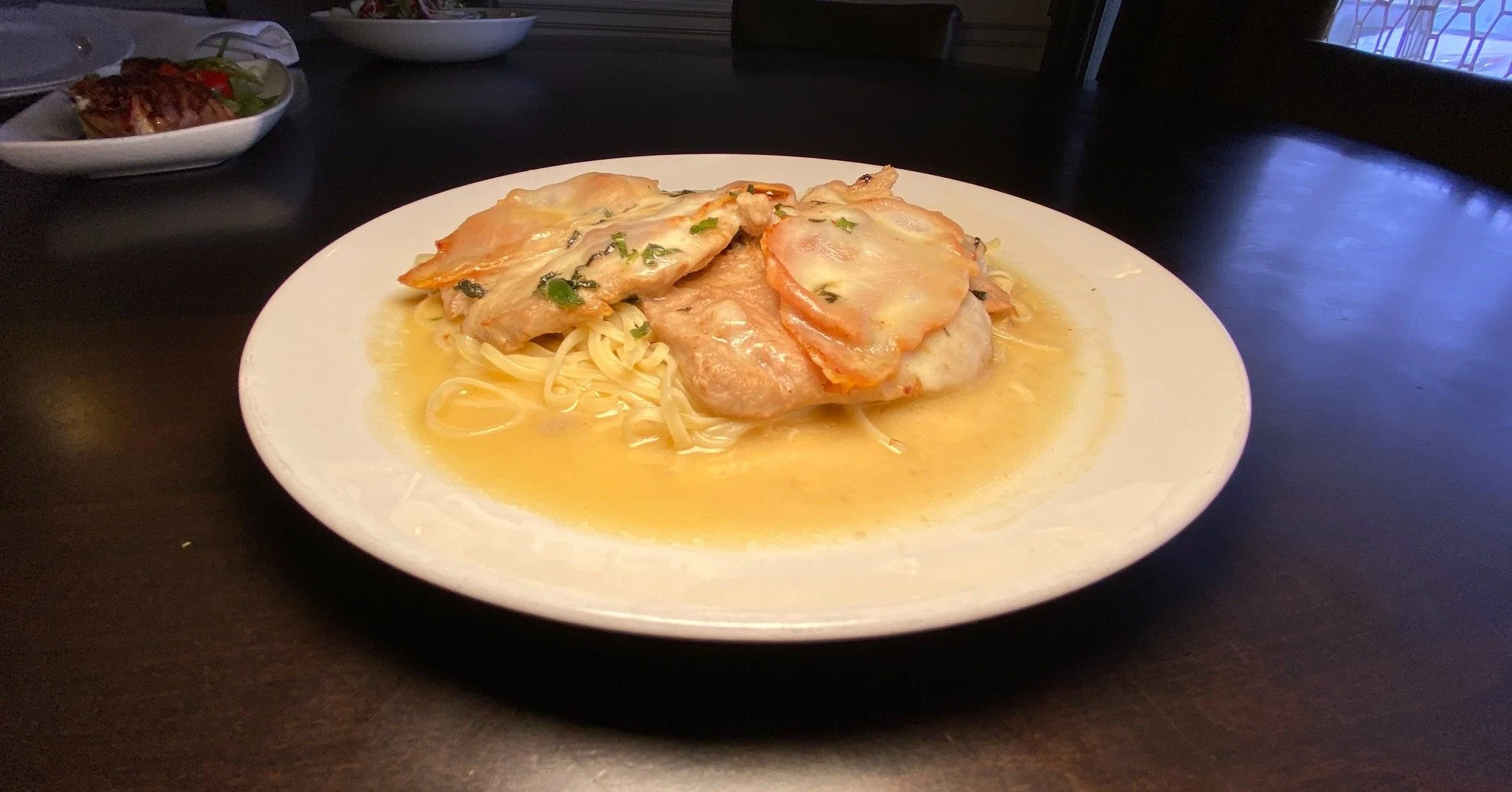 This is comfort with a little elegance.

Our Saltimbocca brings it all together. Prosciutto layered over your choice of chicken or veal, melted provolone, and a sage white wine butter sauce that ties every bite together. Served over pasta made for so