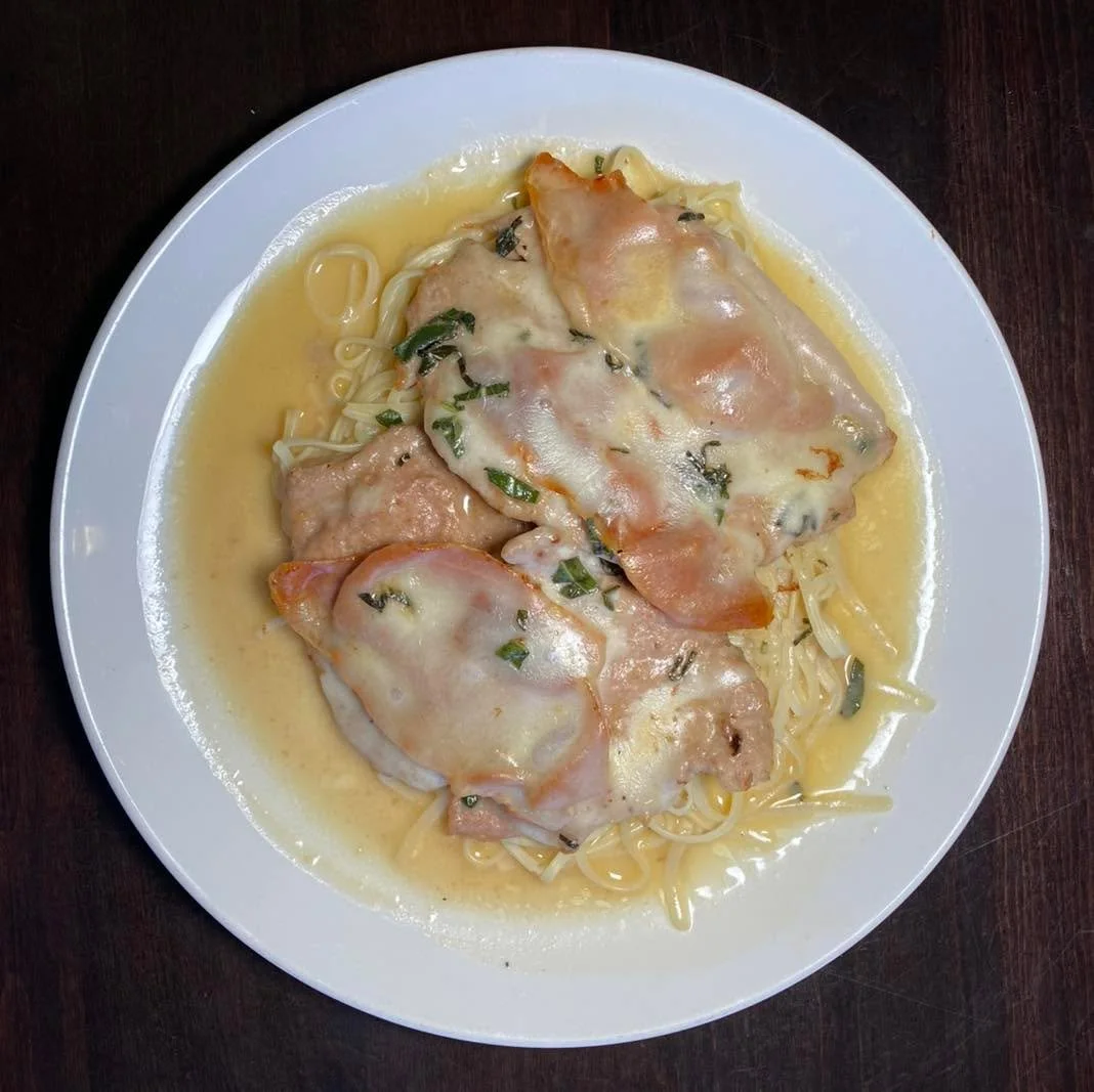 Some dishes never go out of style.

Our Saltimbocca brings together your choice of tender chicken or veal, layered with prosciutto and provolone, then finished in a sage white wine butter sauce that ties everything together. Served over pasta, it&rsq