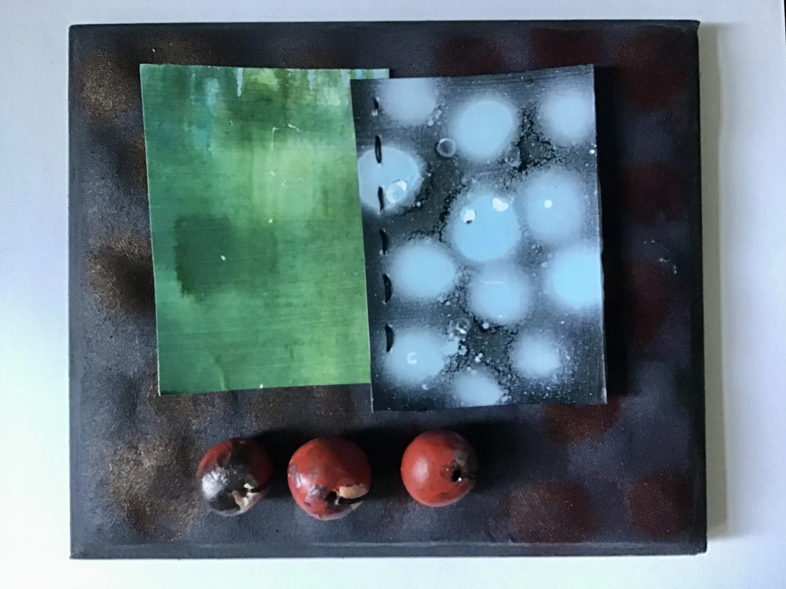 From the series 'Tem de se sonhar com os lugares, para se aprender a gostar deles'. Wood, sponge, discarded nylon, acrylics, watercolour, spray paint, paper and plaster, 25x30cm, 2026.