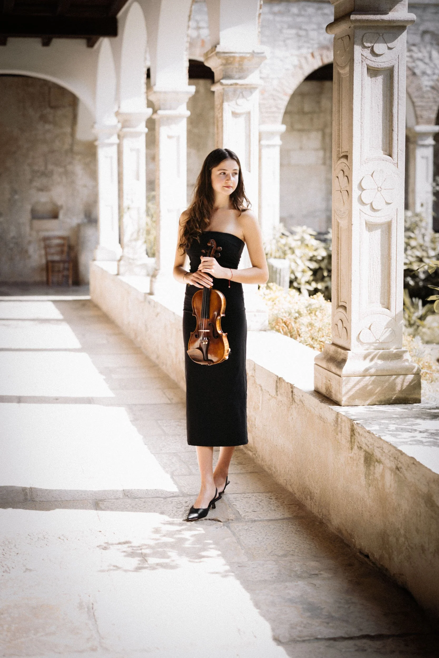 Elegant musician photography in beautiful surroundings.