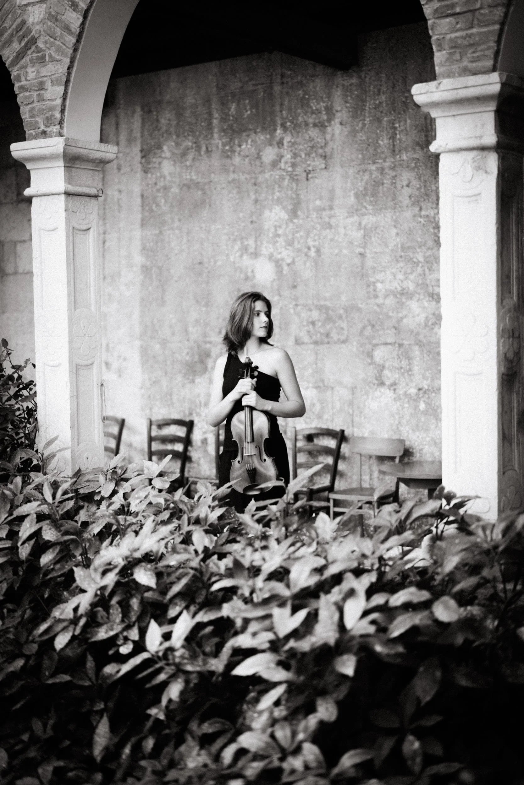 Musician portrait of a violinist in a beautiful outdoor location