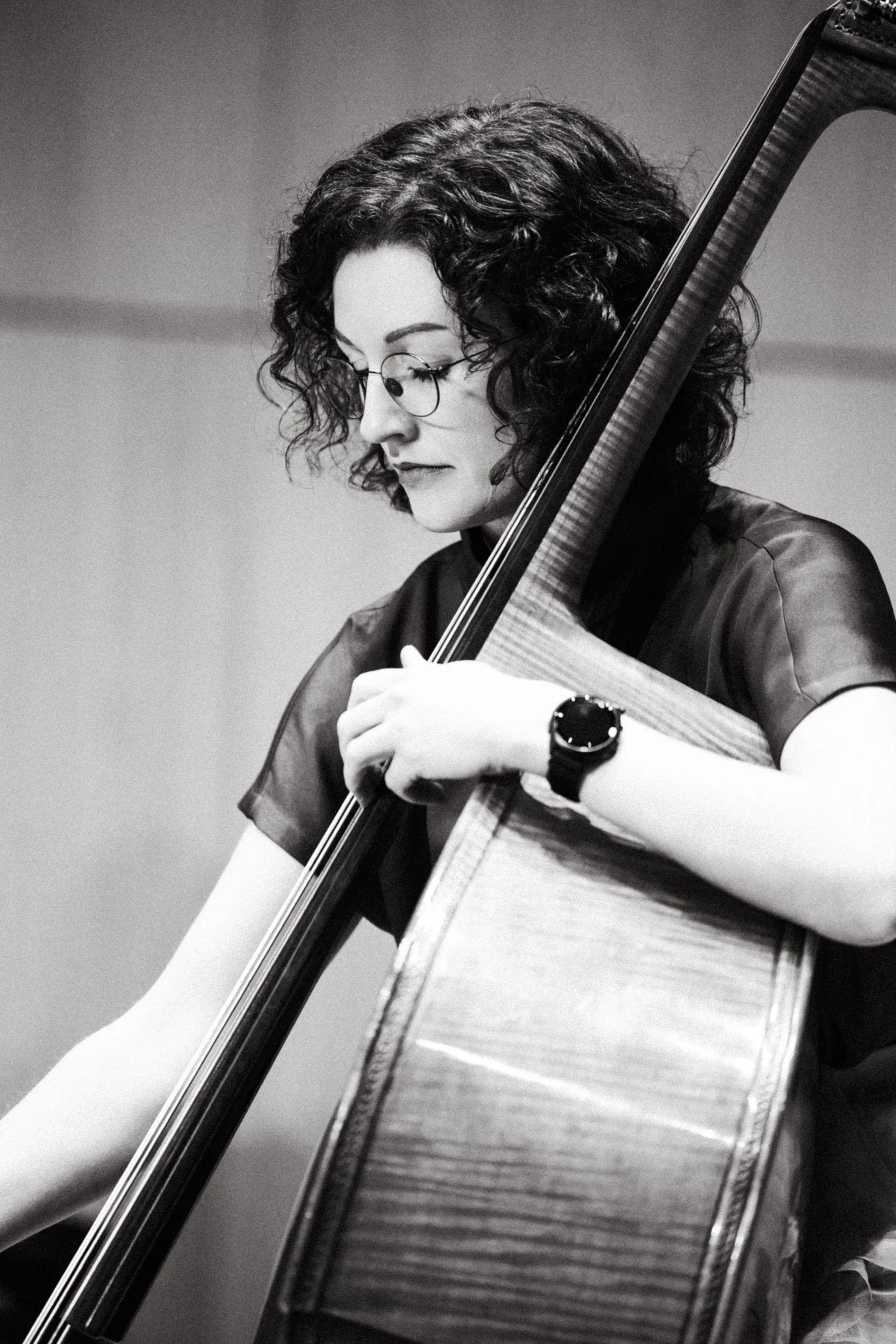 Close up portrait of a cellist in black and white during a concert near Frankfurt am Main.