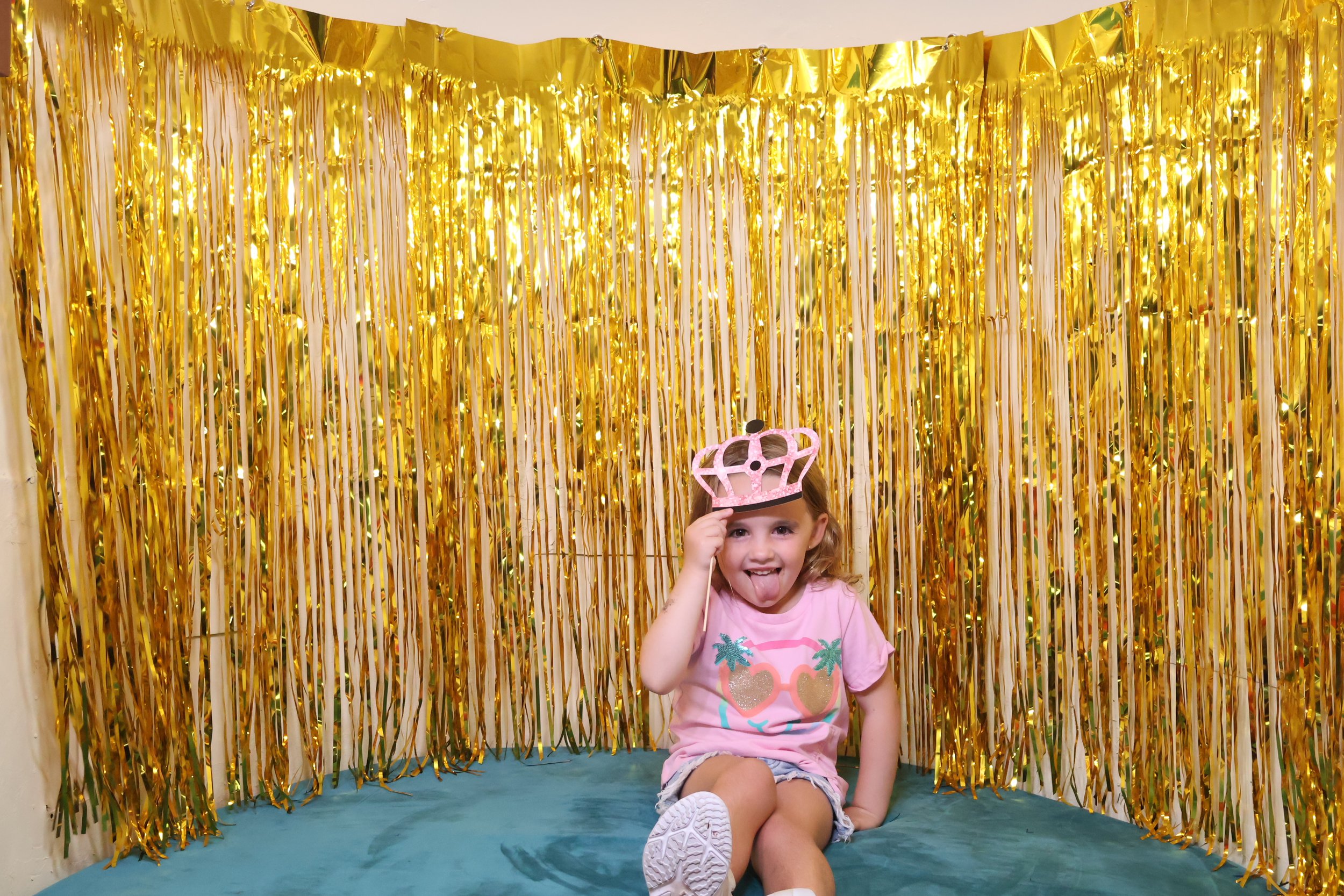 Cute child with props in a Photo Booth Rental