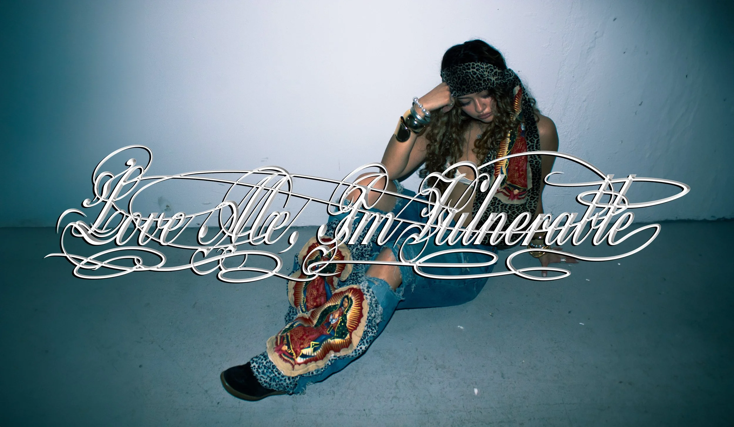 A young woman with curly hair sitting on the floor against a plain wall, wearing a patterned headscarf, colorful clothes, and jewelry, with a large stylized text overlay reading 'Love, Alice, and Unconventional' in elegant cursive.