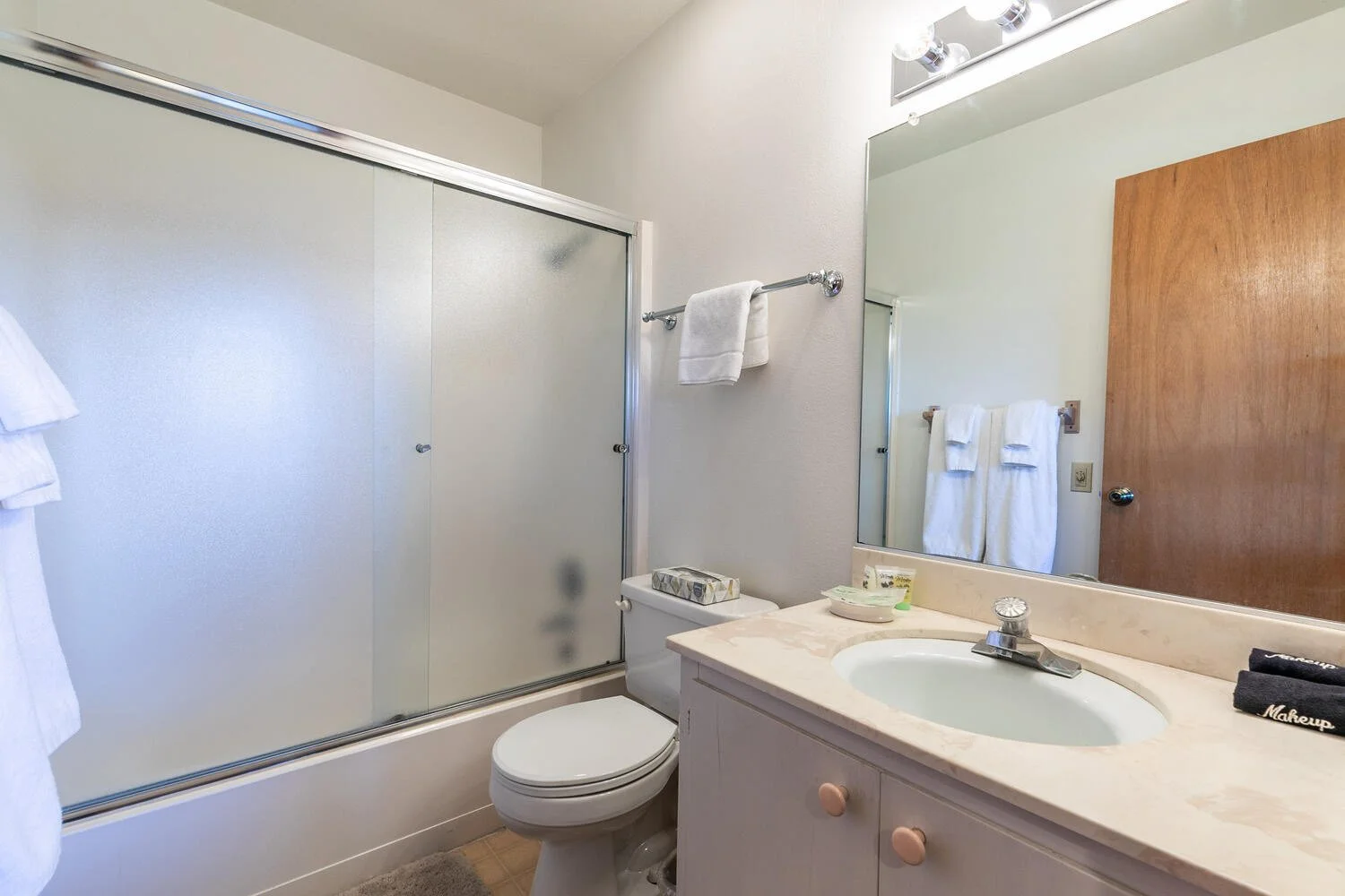 unit 14 second bathroom with pale granite counter