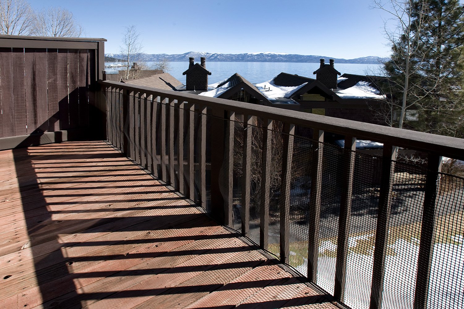 unit 23 view of snow and lake from back deck