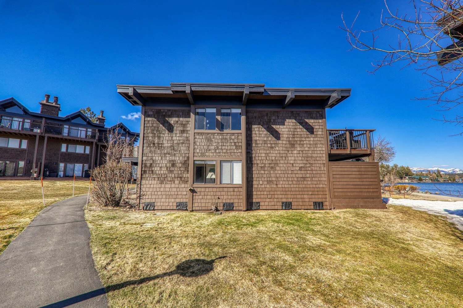 unit 41 side exterior wood-shingled 2-story building