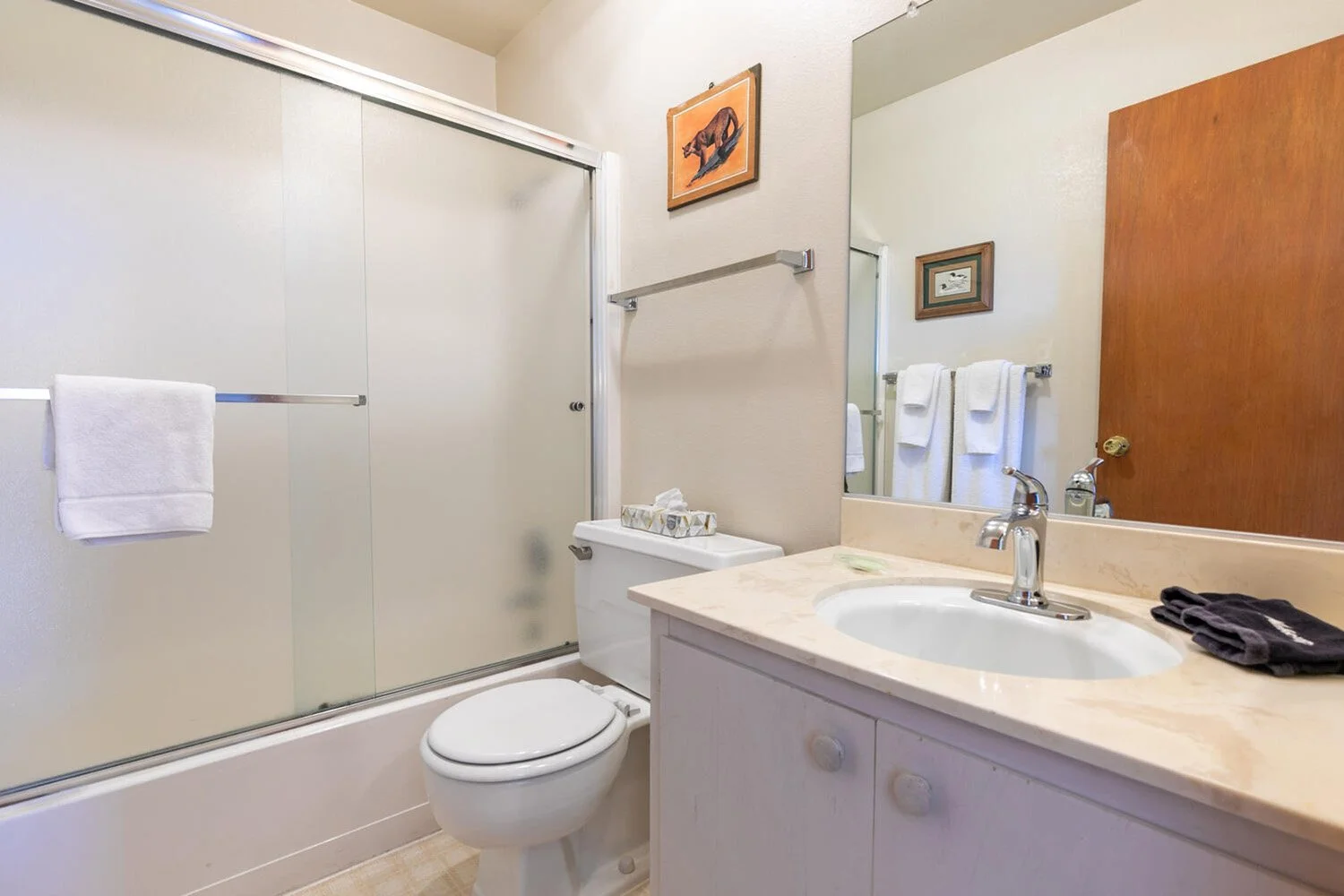 unit 22 master bath showing shower and toilet