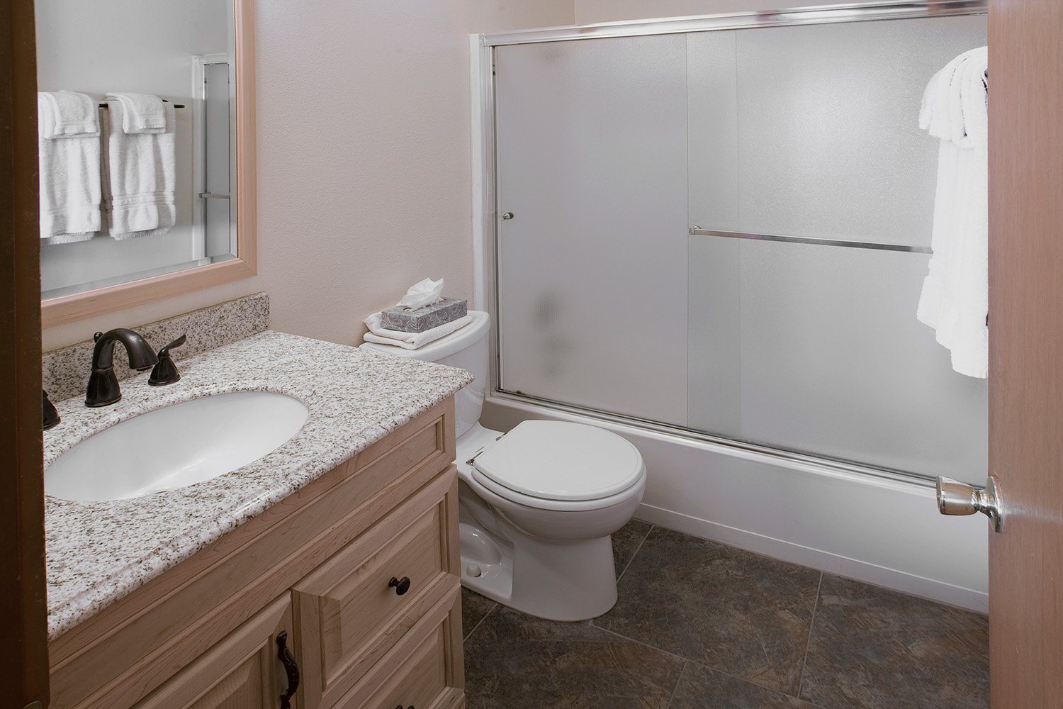 unit 23 bathroom showing tub/shower combo