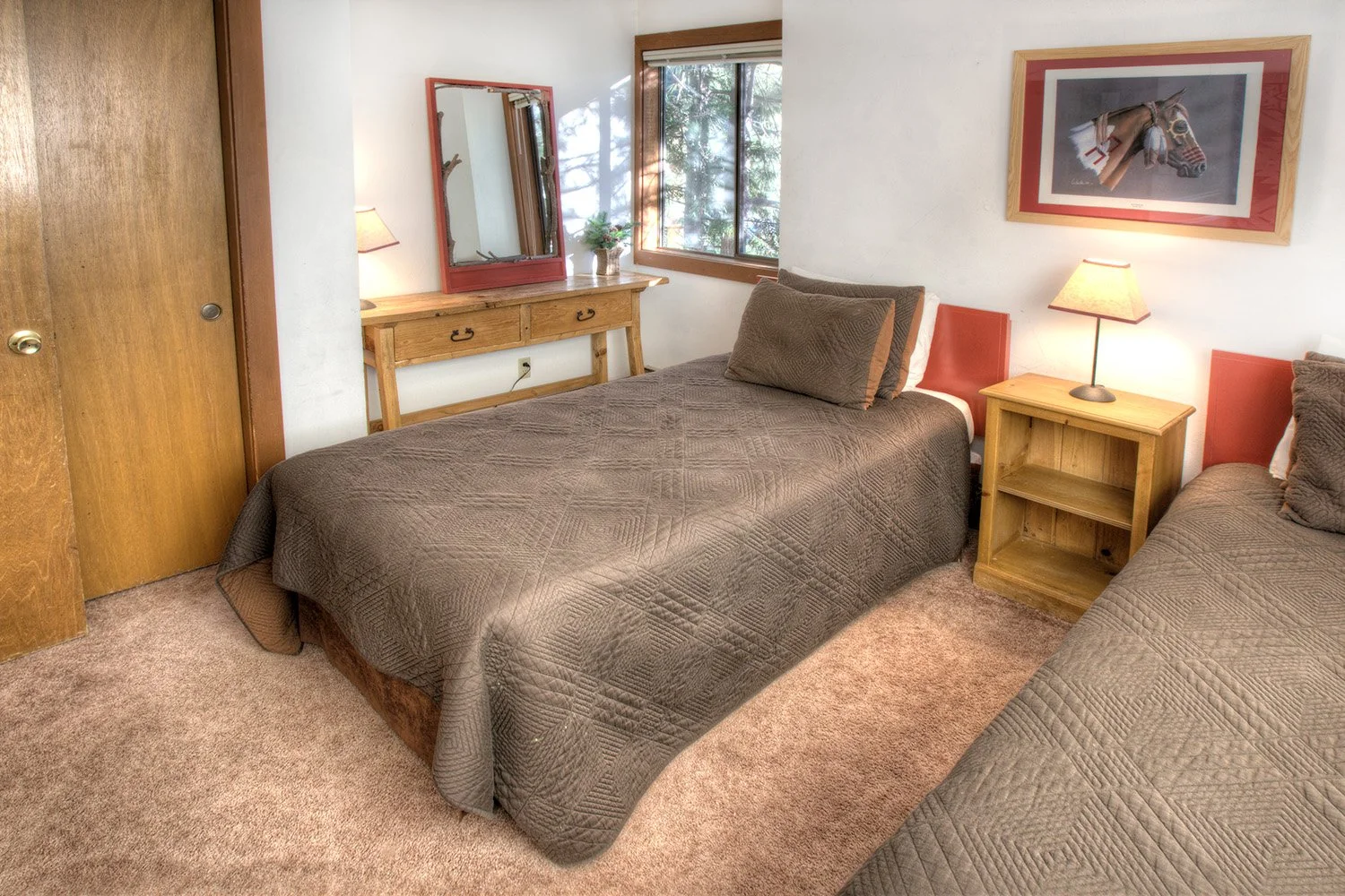 unit 5 second bedroom two twin beds, pinkish-tan carpeting
