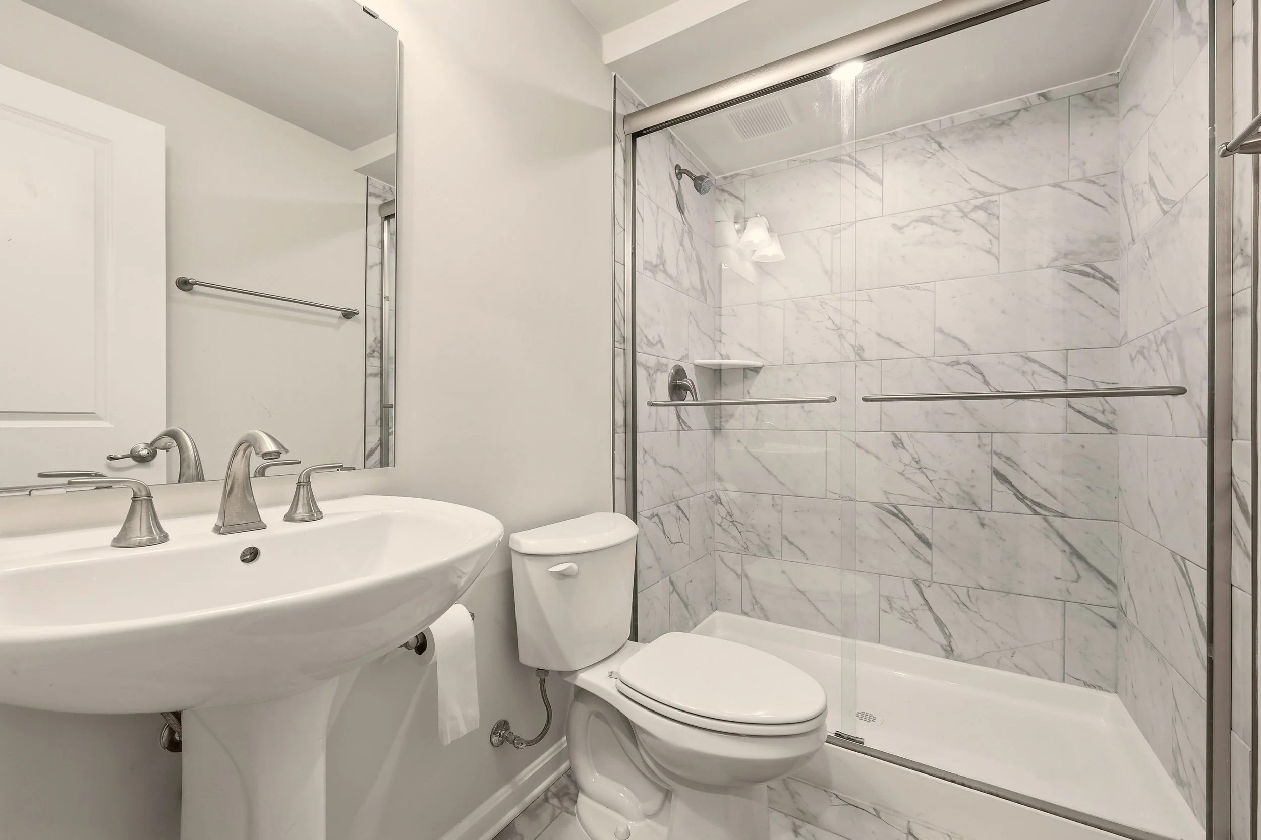 Interior real estate photography highlighting natural light bathroom in a Martinsburg West Virginia home