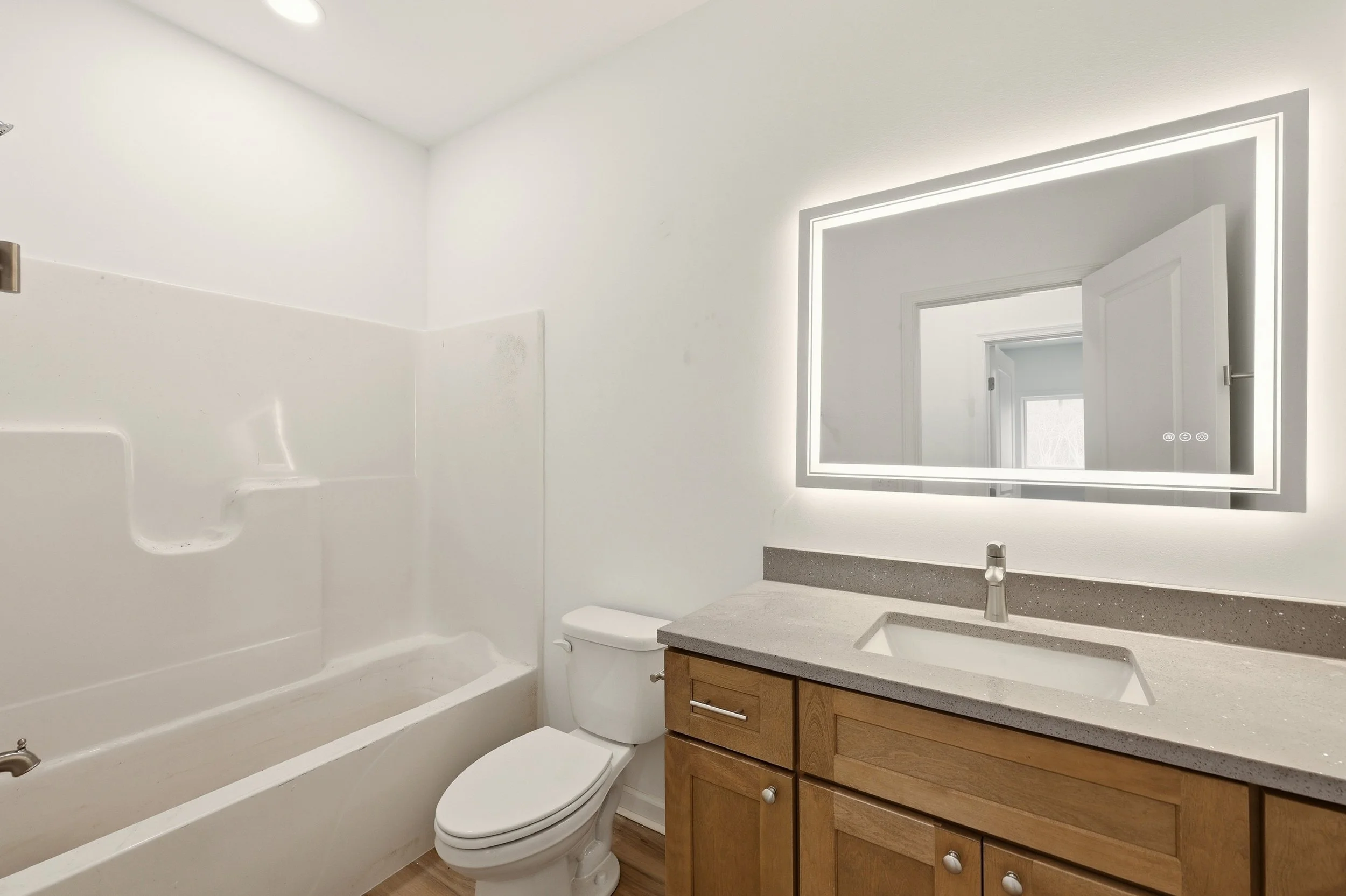 Interior real estate photography highlighting natural light bathroom in a Hedgesville West Virginia home