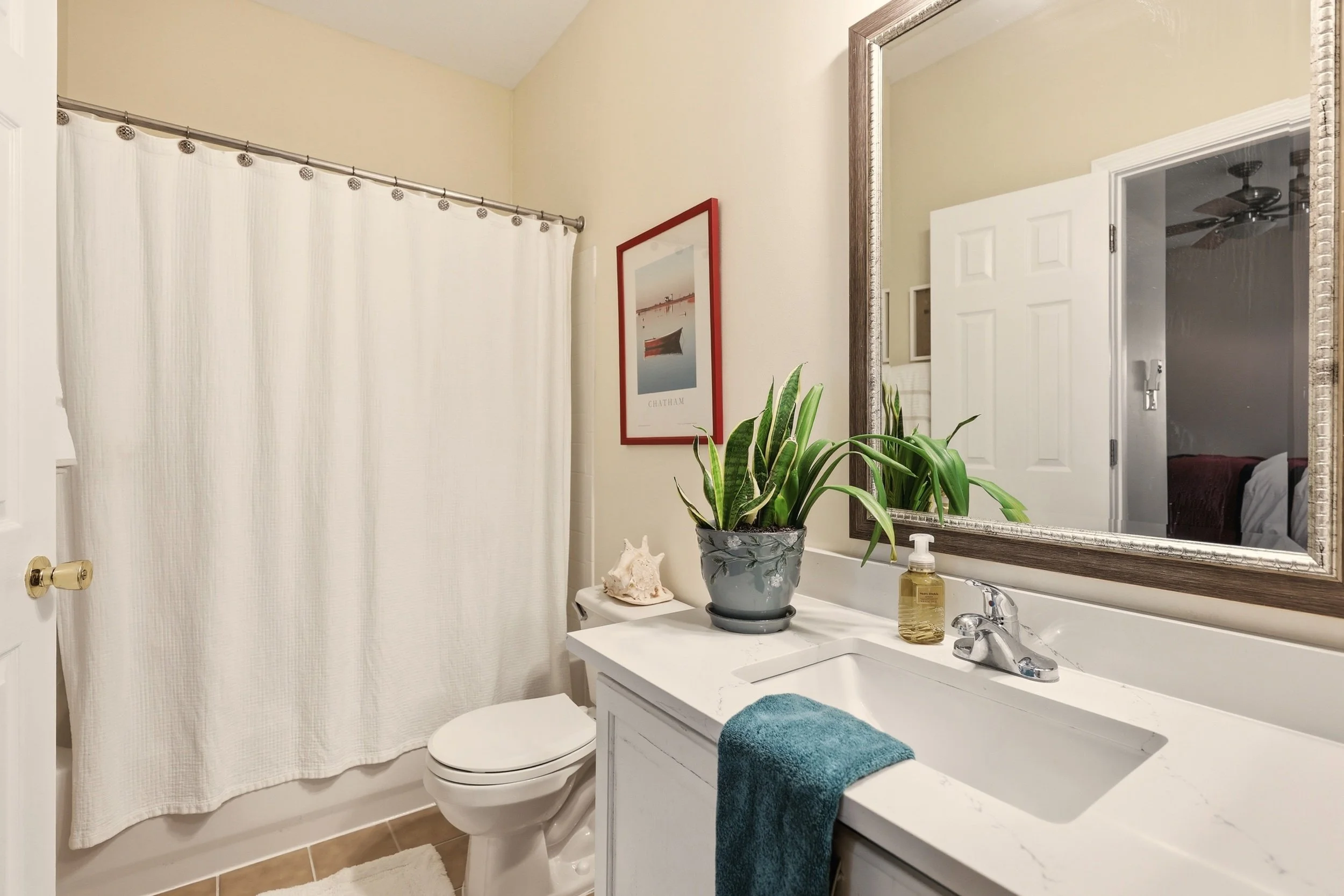 Interior real estate photography highlighting natural light bathroom in a Martinsburg West Virginia home