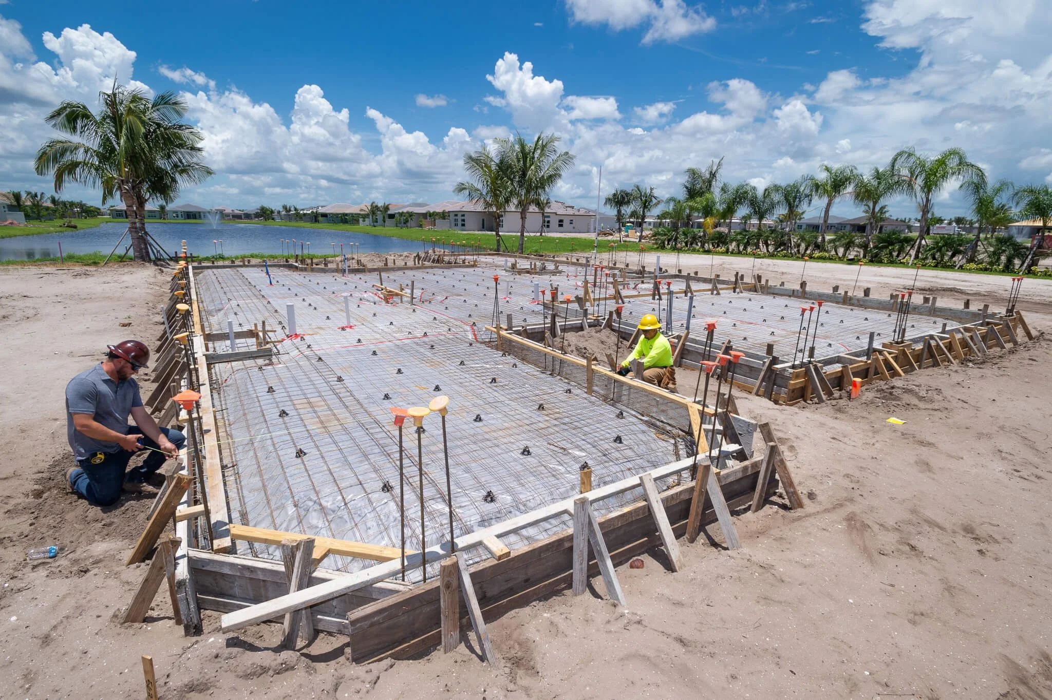 Concrete form and pour at Valencia Bay in Boynton Beach, FL, by GL Homes. A large scale active adult community.