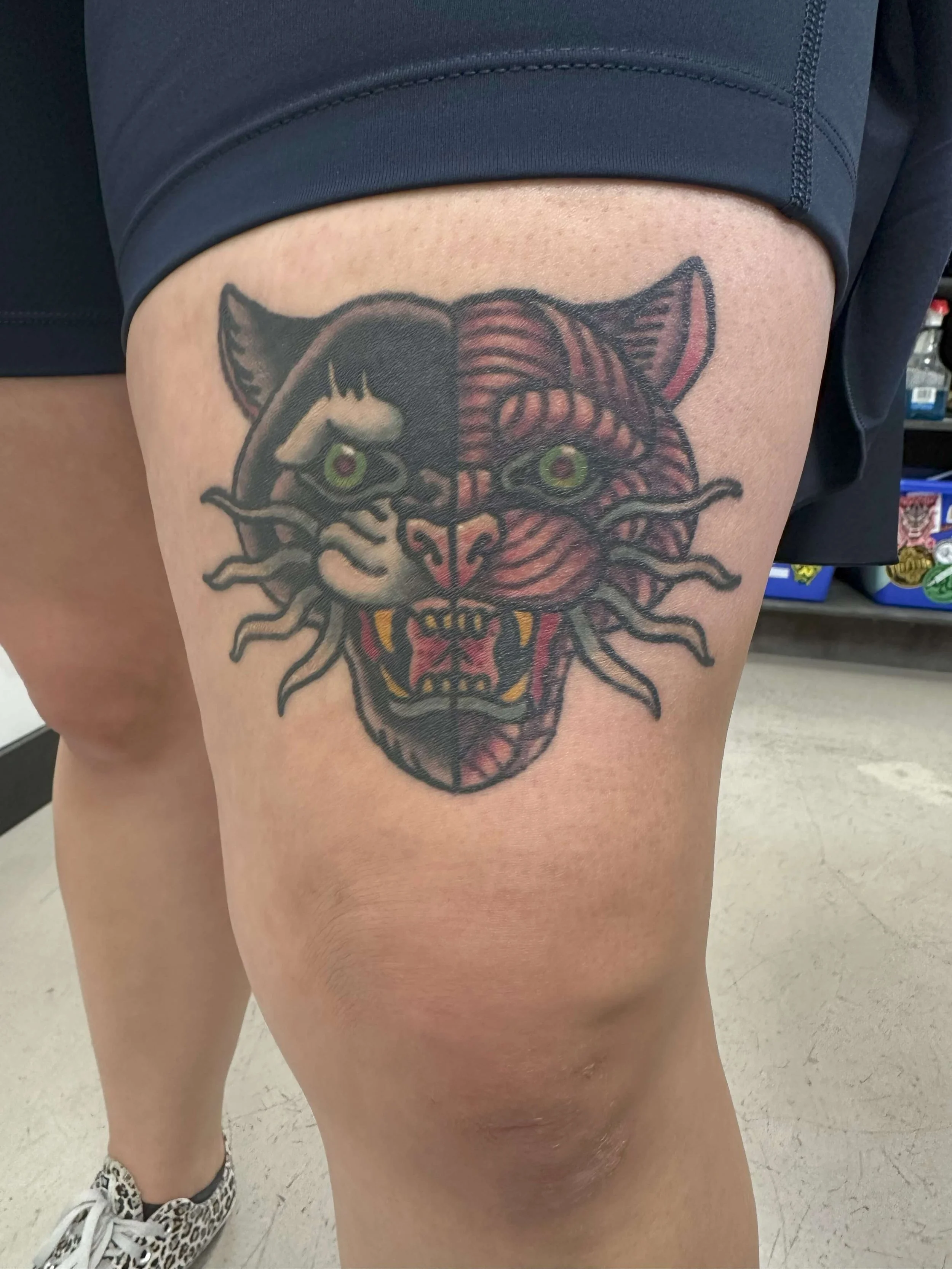 healed-muscle-panther-head-tattoo.jpeg
