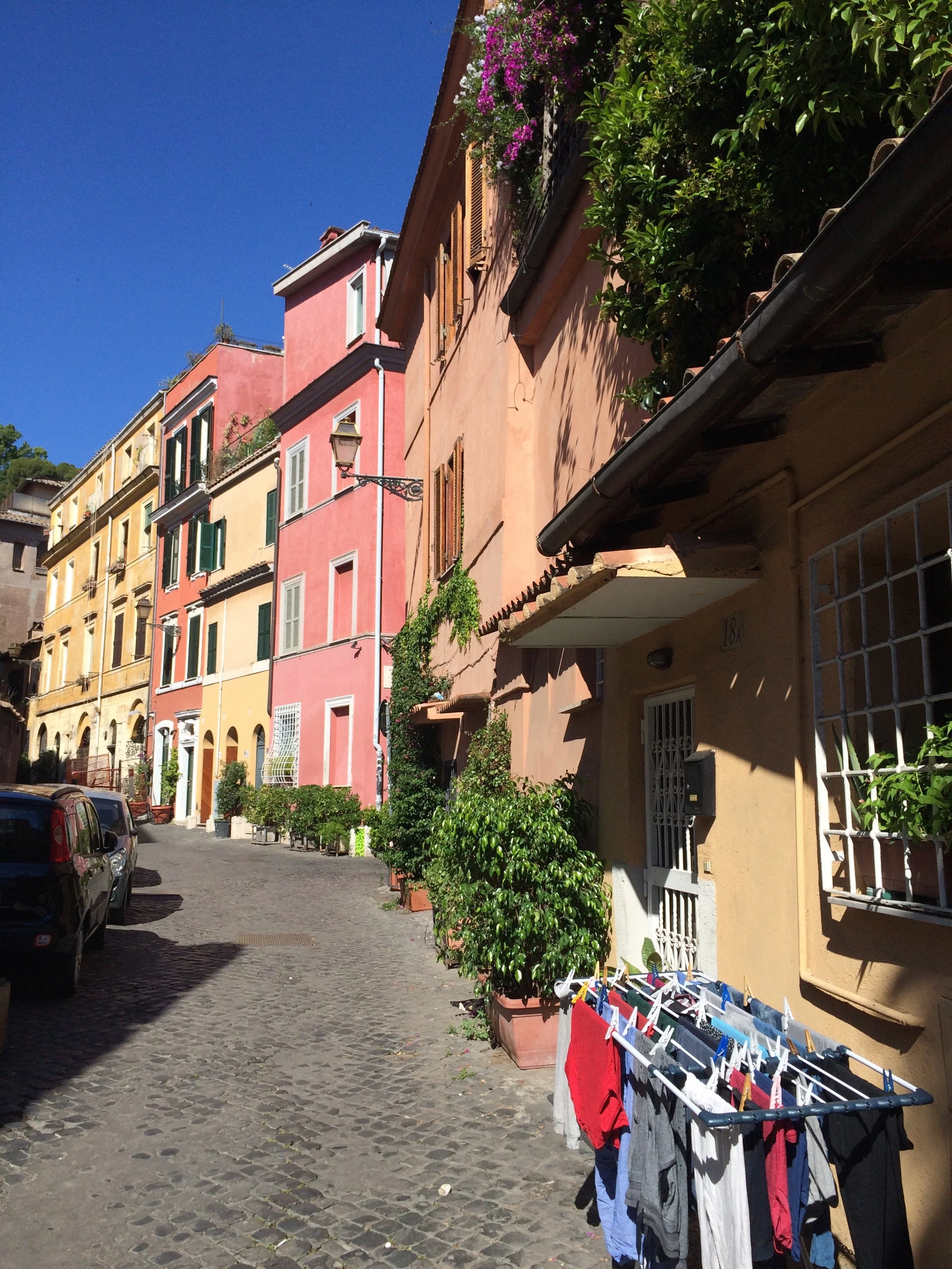 Rome Trastevere Street with Colored Buildings and Laundry.jpg