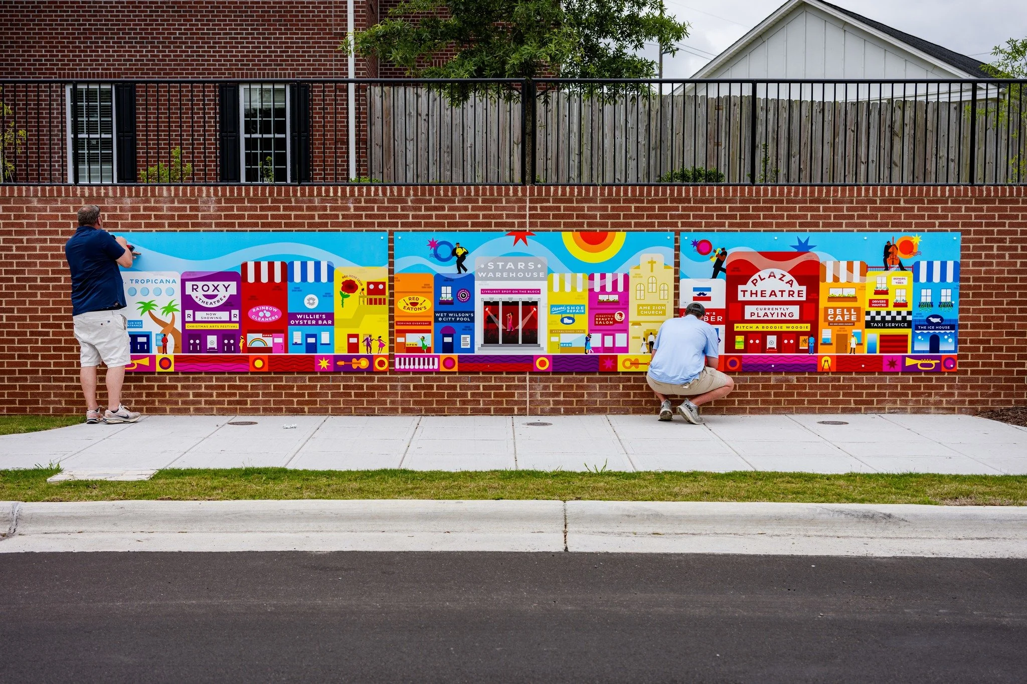 Round about mural install.jpg