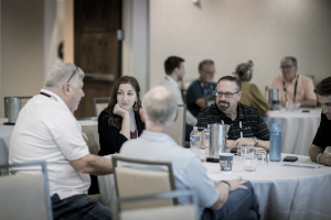 Group of people talking at a table