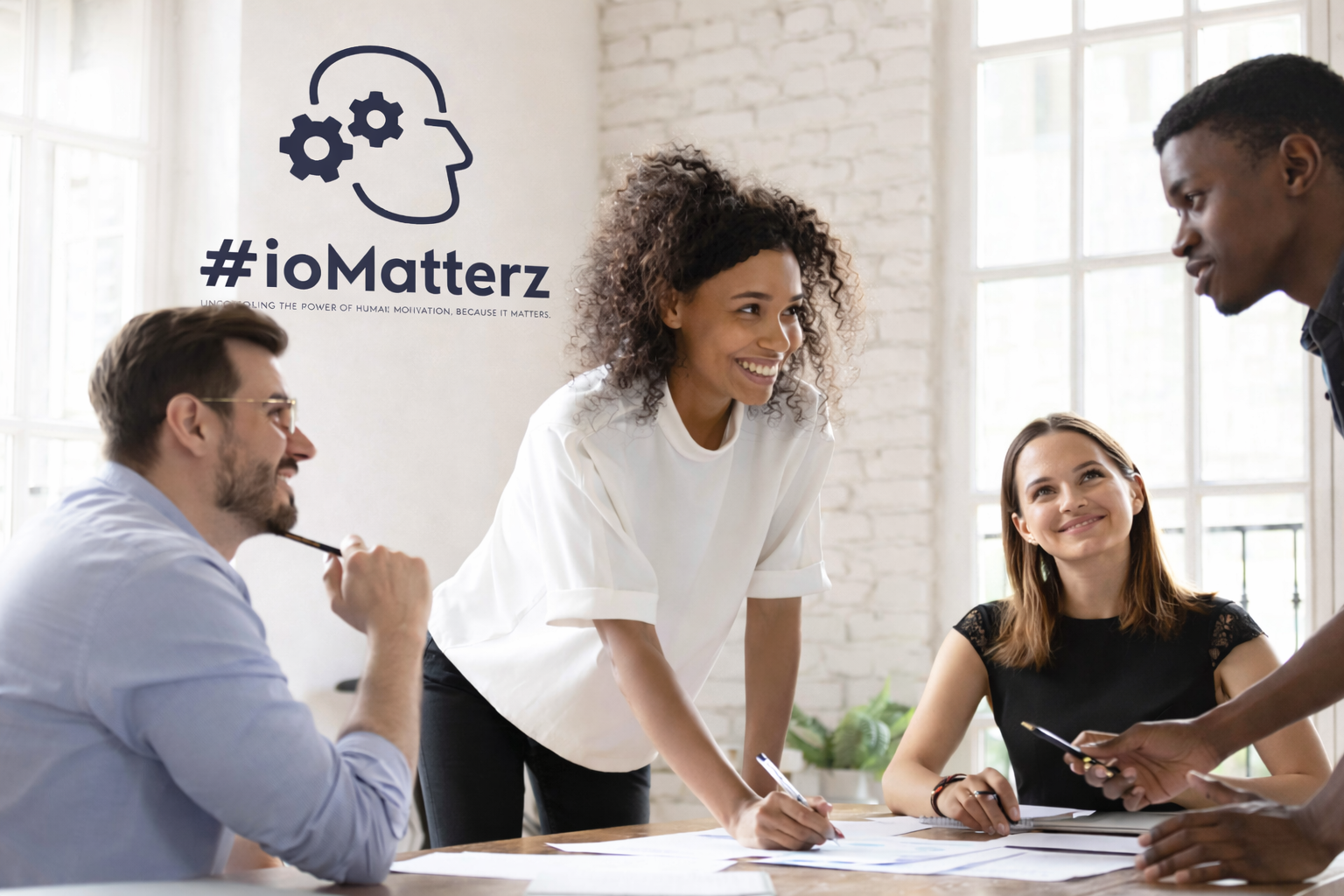 Team discussion in a bright office.png