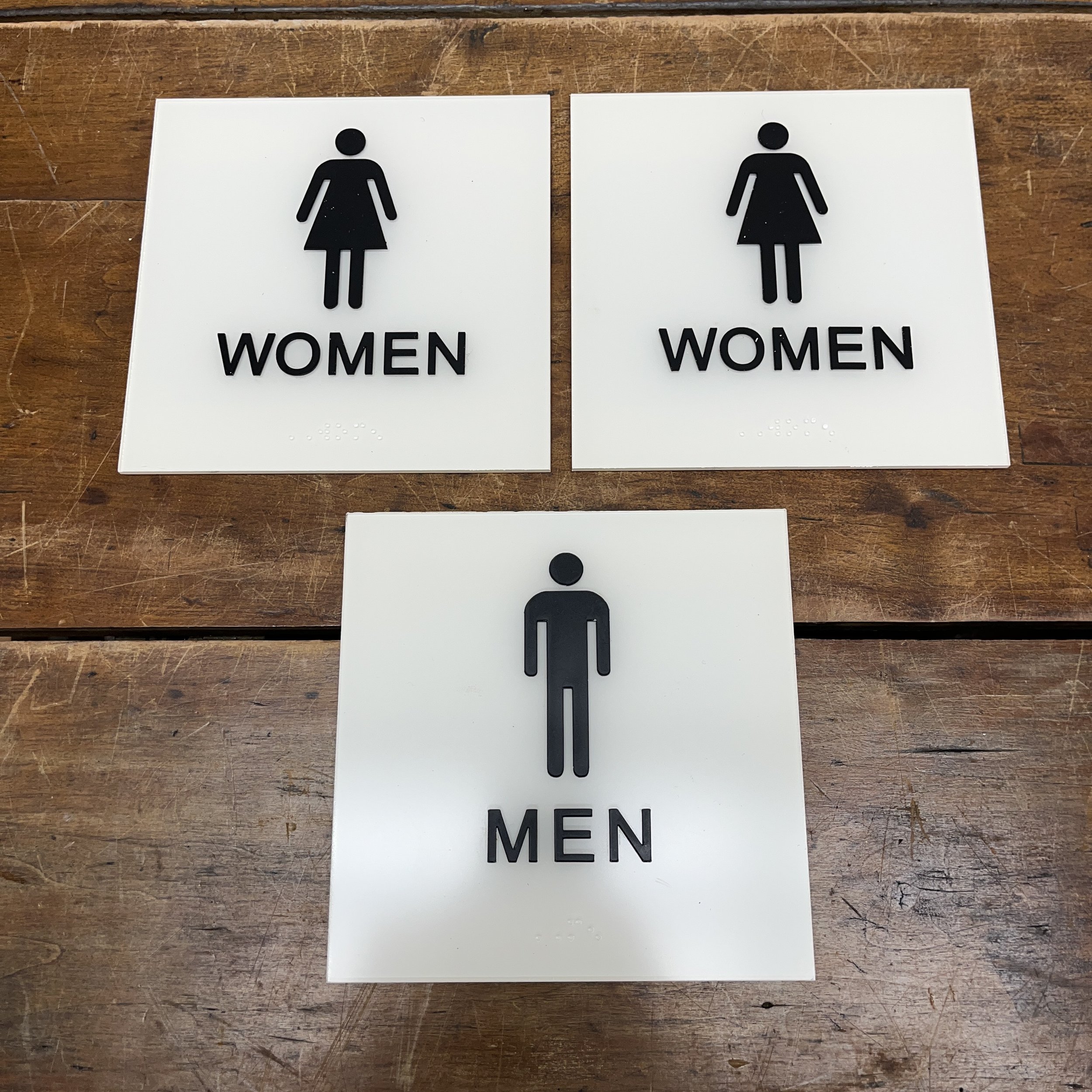 Men & Women Signs - $9
