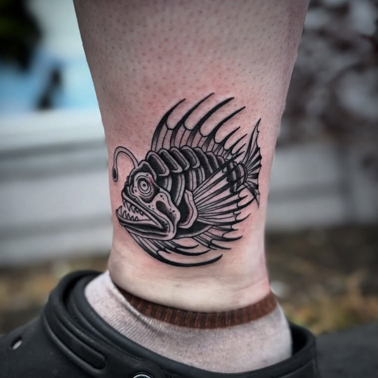 Angler fish for Sam&rsquo;s ankle.
I want to tattoo more weird fish and little creatures. If you want to get in send me an email or message. Booking January now and have two weeks left open. 
.
.
.
.
.
.
.
.
.
.
.
.
#fishtattoo #anglerfish #mainetatt
