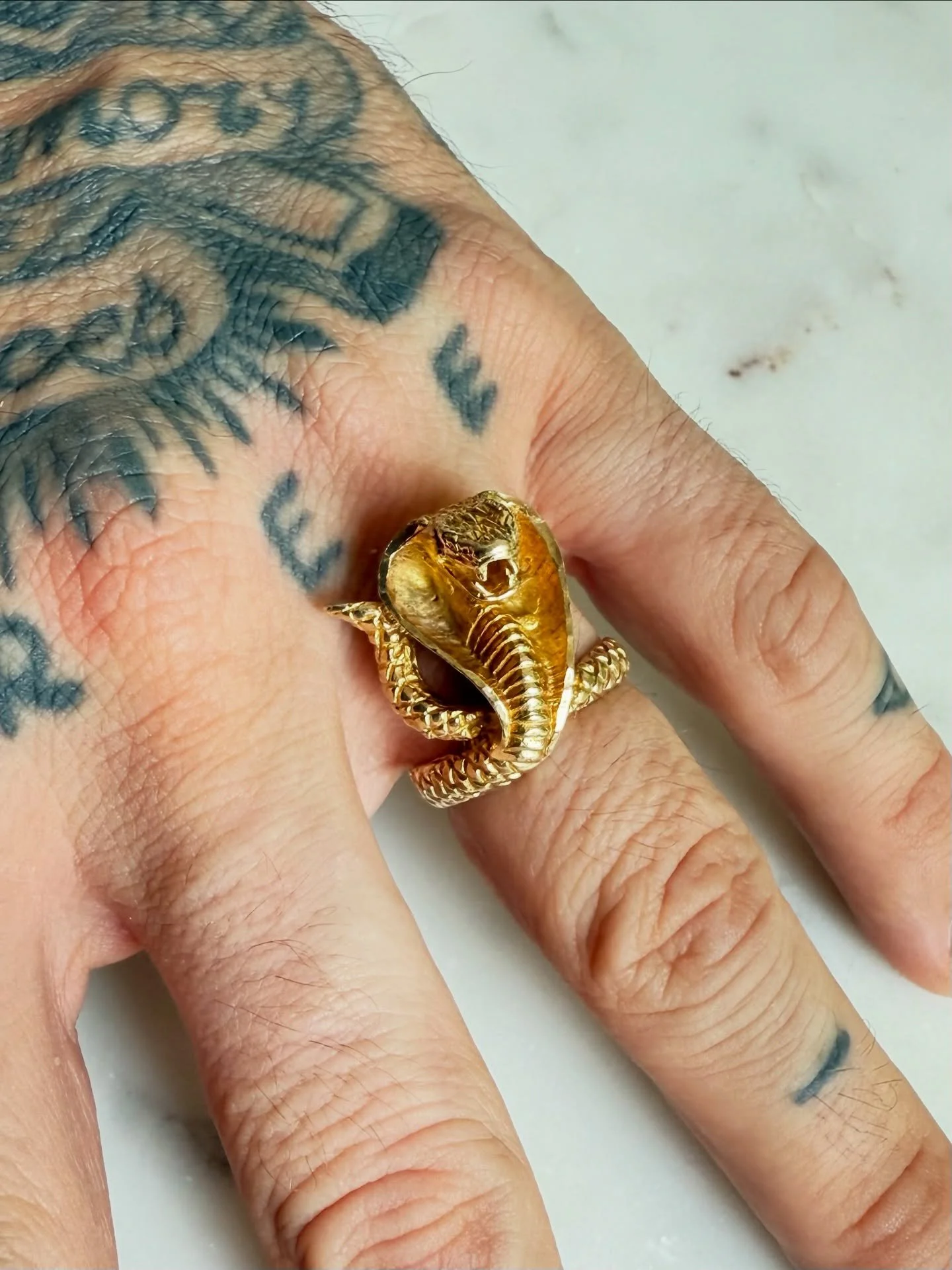 COBRA ALERT!

This thing is BAD! Full on cobra power! Ruby eyed and all! 

10K Cobra with Ruby Eyes - Size 9.5

$785

#10K #gold #cobraring #snakering #cobrawithrubyeyes #goodboyjewelry