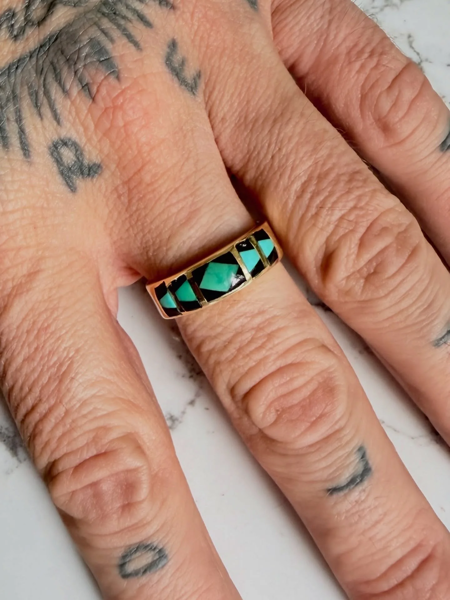 This is another amazing Navajo artist made ring! Hallmarked &lsquo;GL&rsquo;, this is a signed, beautifully inlaid piece! Made with 14K gold, this ring is inlaid with onyx &amp; turquoise! This ring is handcrafted and ready to be added as a unique, m