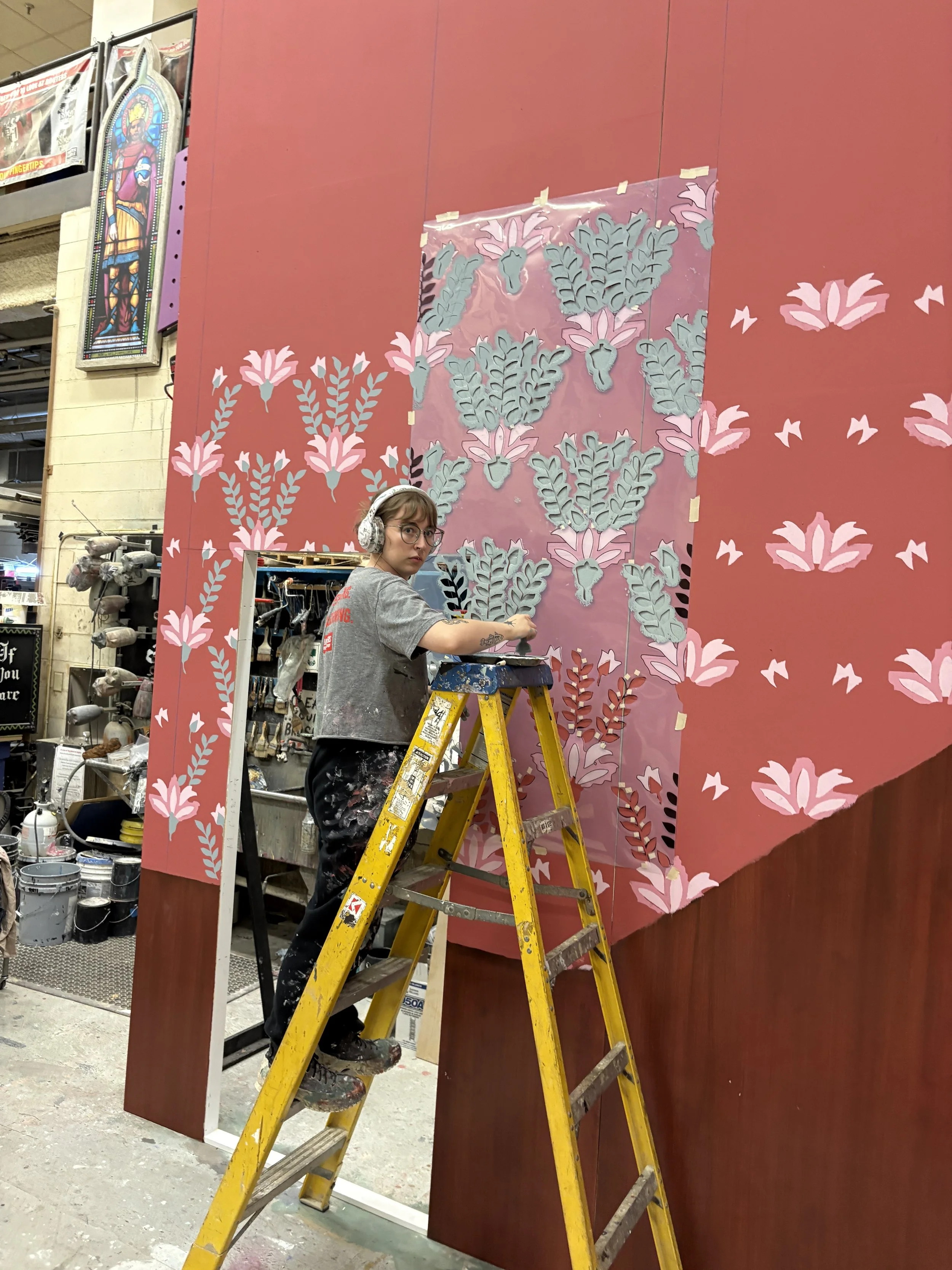 The wallpaper was painted as a 3-color stencil.  I plotted 3'x6' stencils on acetate.