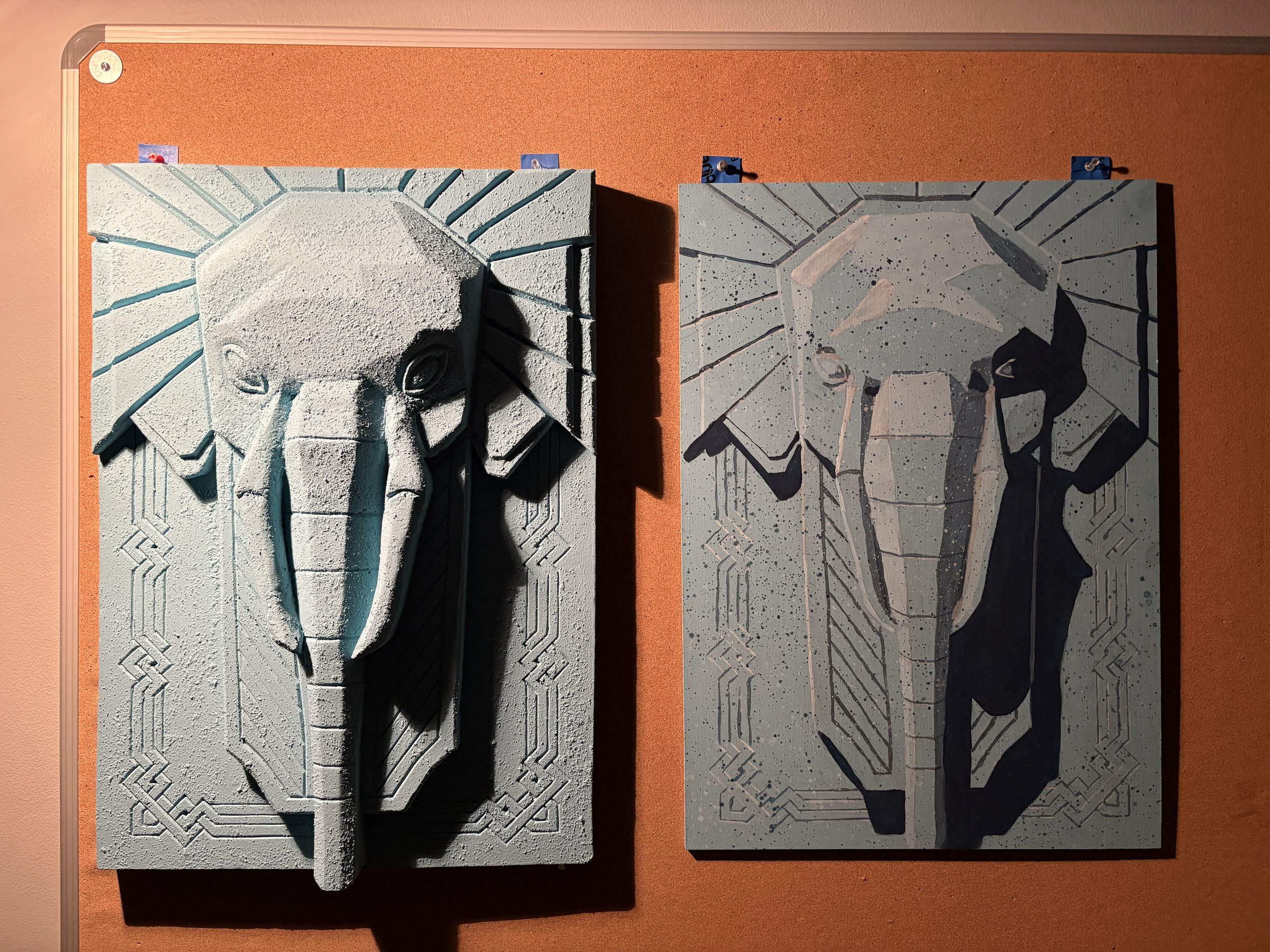 The sculpture and Trompe l'Oeil painting side by side.