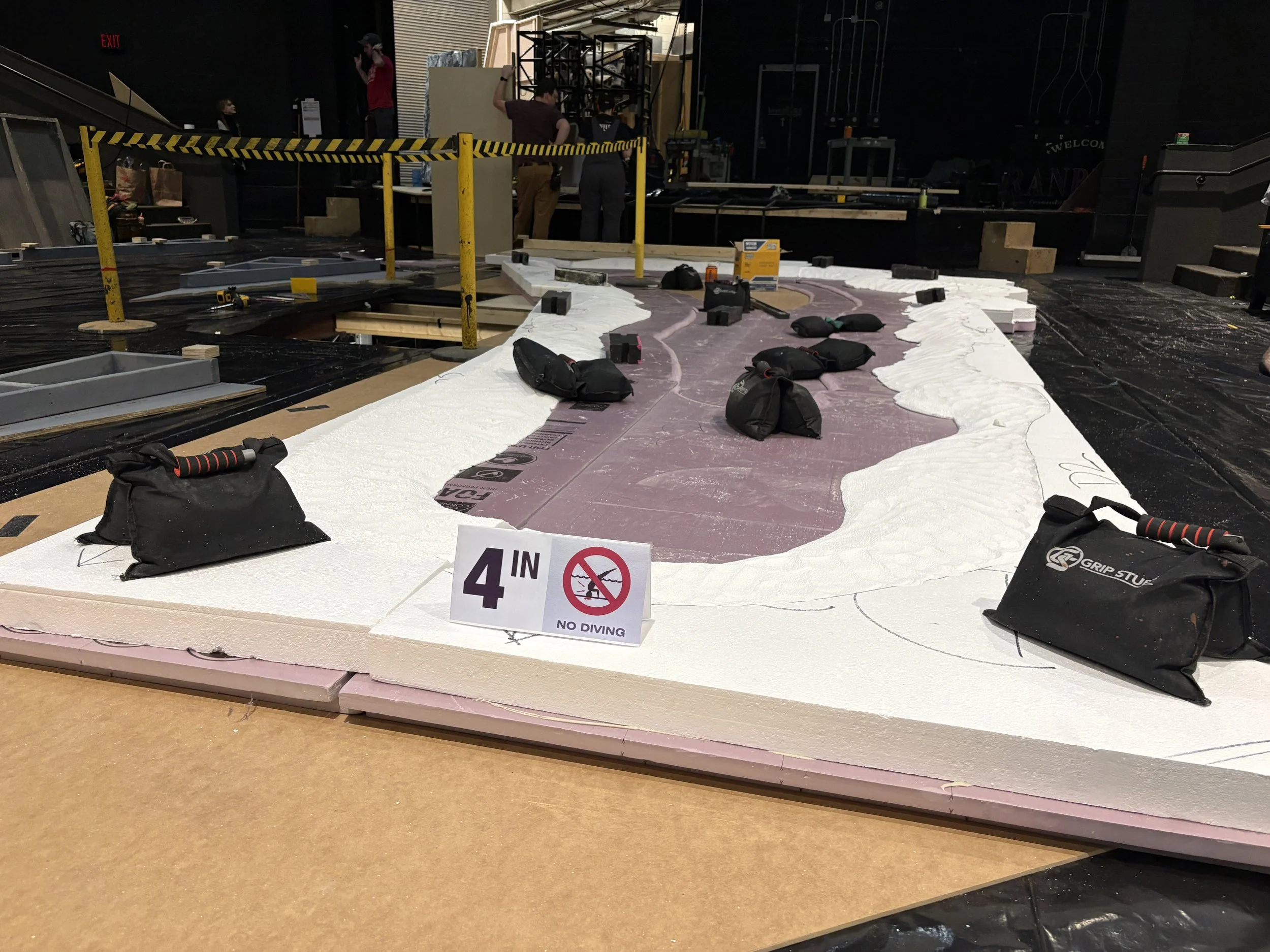 Foam substrate installed with spray foam glue curing