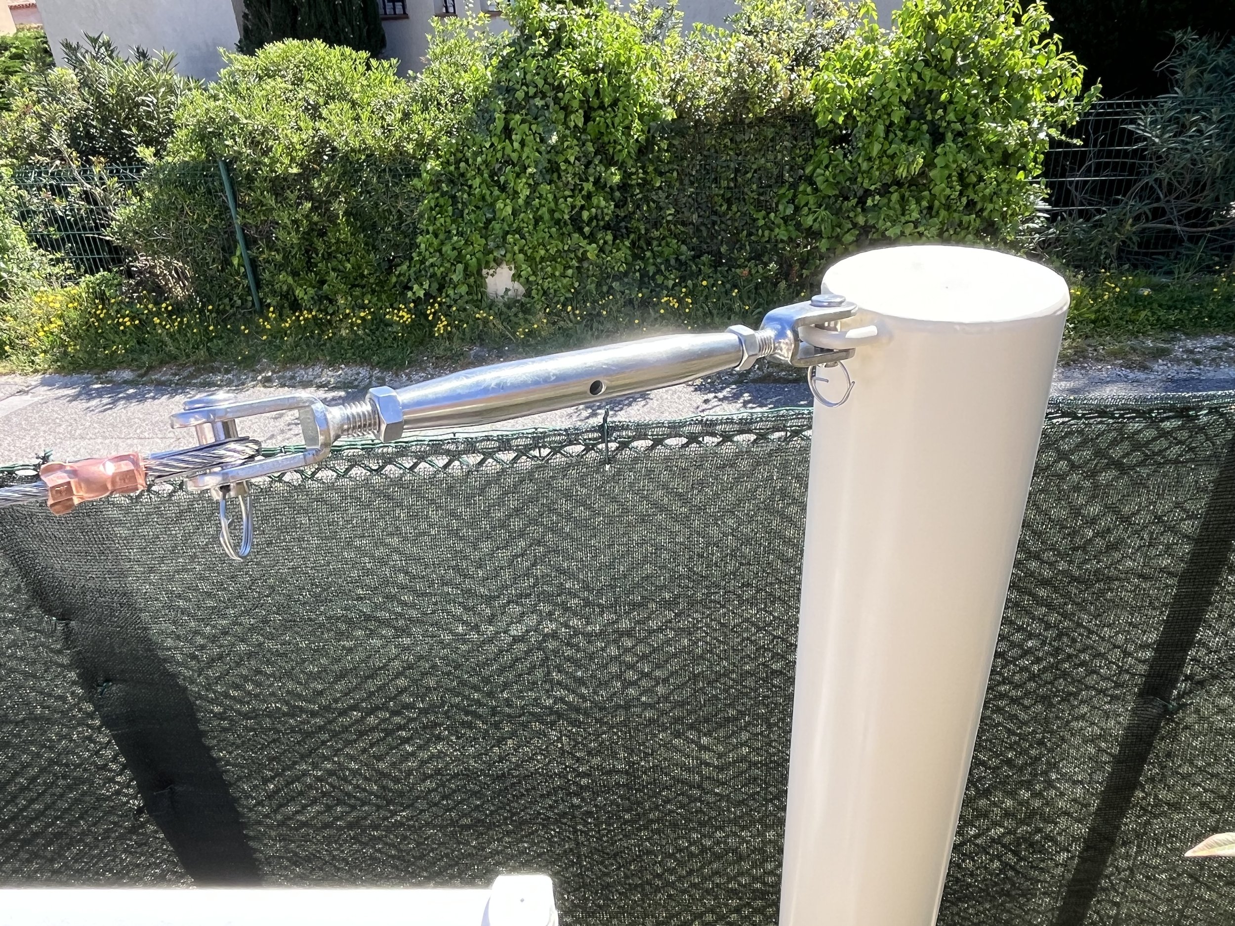 Oasis Ombrage -  Finition et fixation voile d'ombrage 