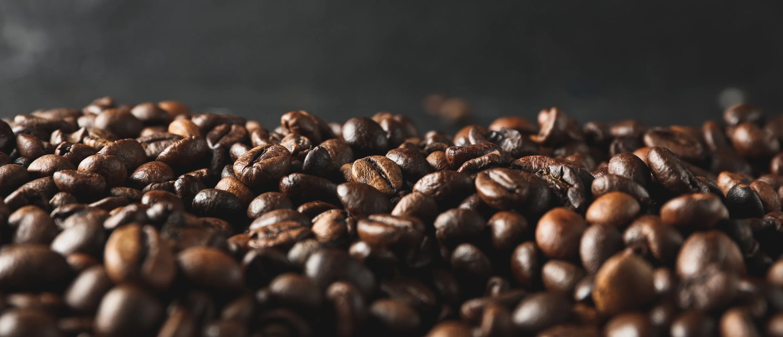 coffee-beans-against-black-background-close-up-an-2026-03-24-23-37-57-utc.jpg