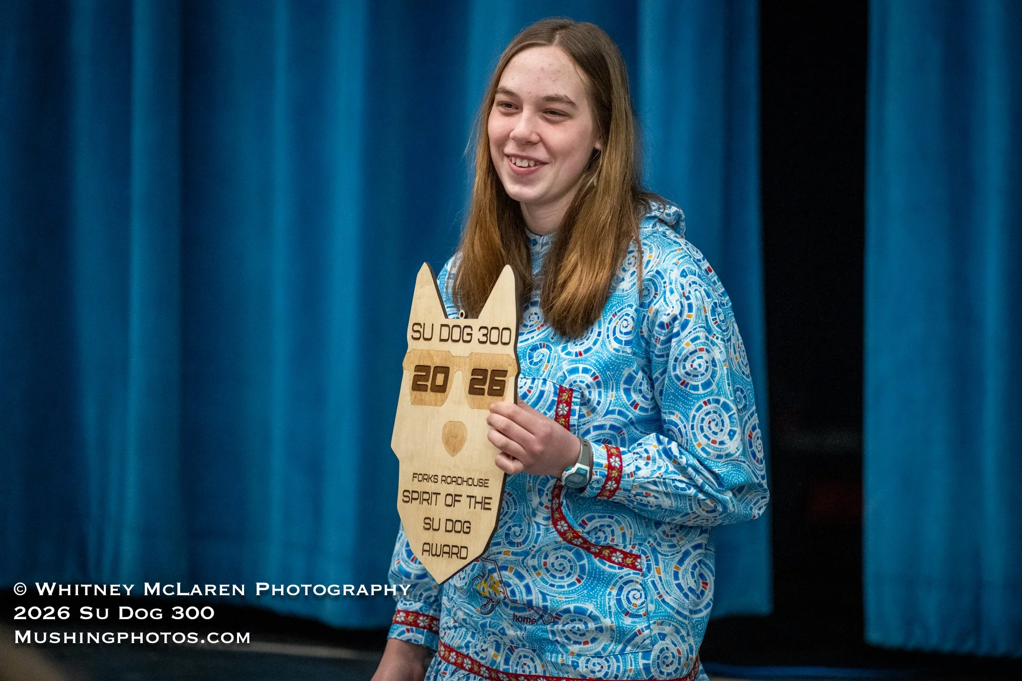 AddieAnn Randall receives the Spirit of the Su Dog Award for exemplifying the passion, care, and dog stewardship embodying the spirit of the race!