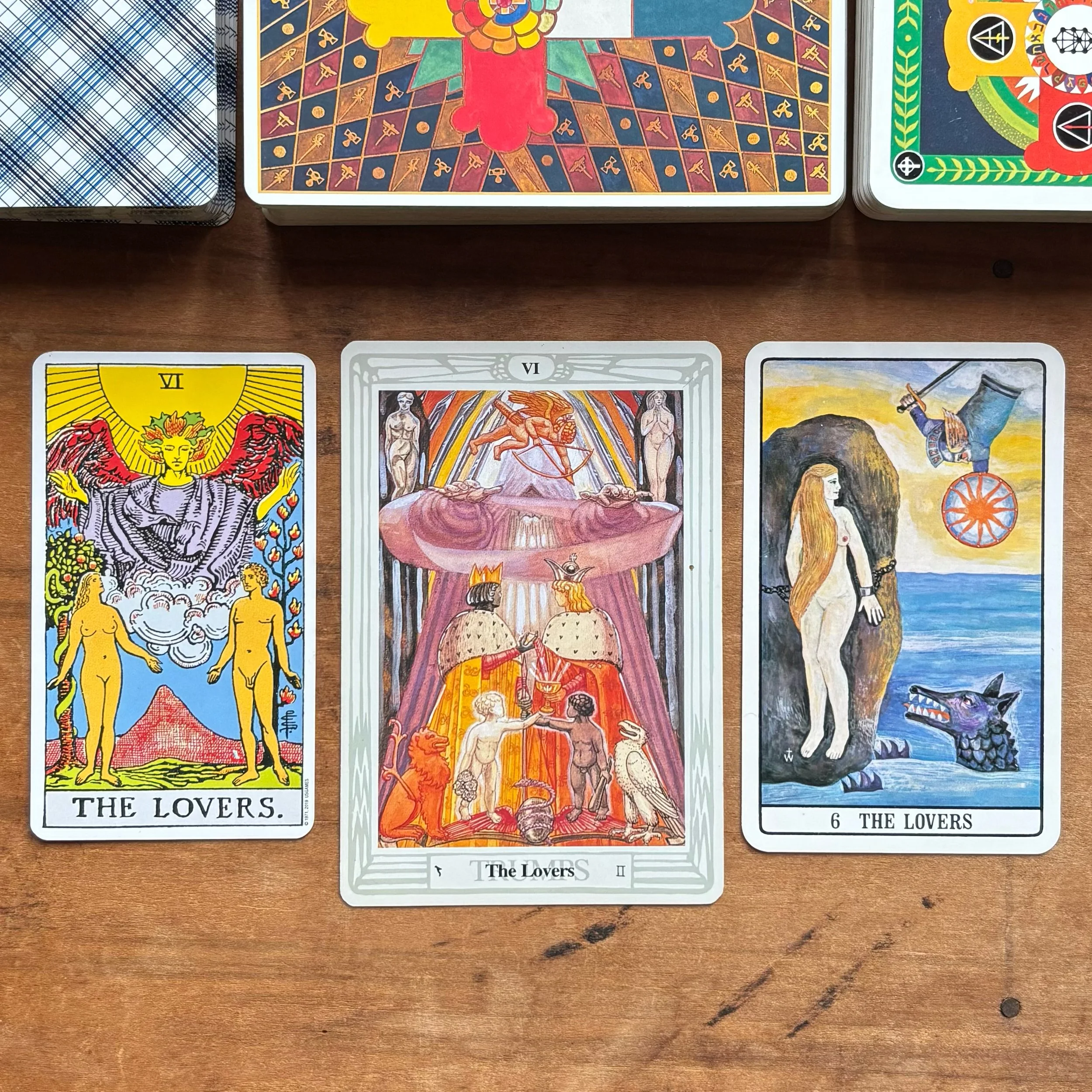 The Lovers tarot cards from the Rider-Waite, Crowley Thoth, and Golden Dawn Tarot