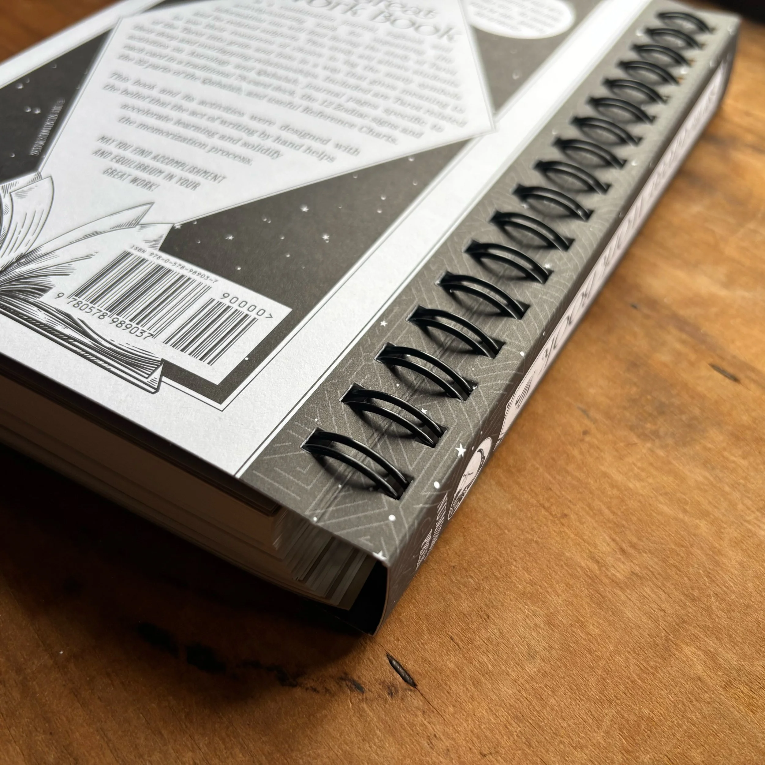 Concealed wire-o binding and wrap-around cover of The Great Work Book study aid, logbook and journal for tarot symbolism