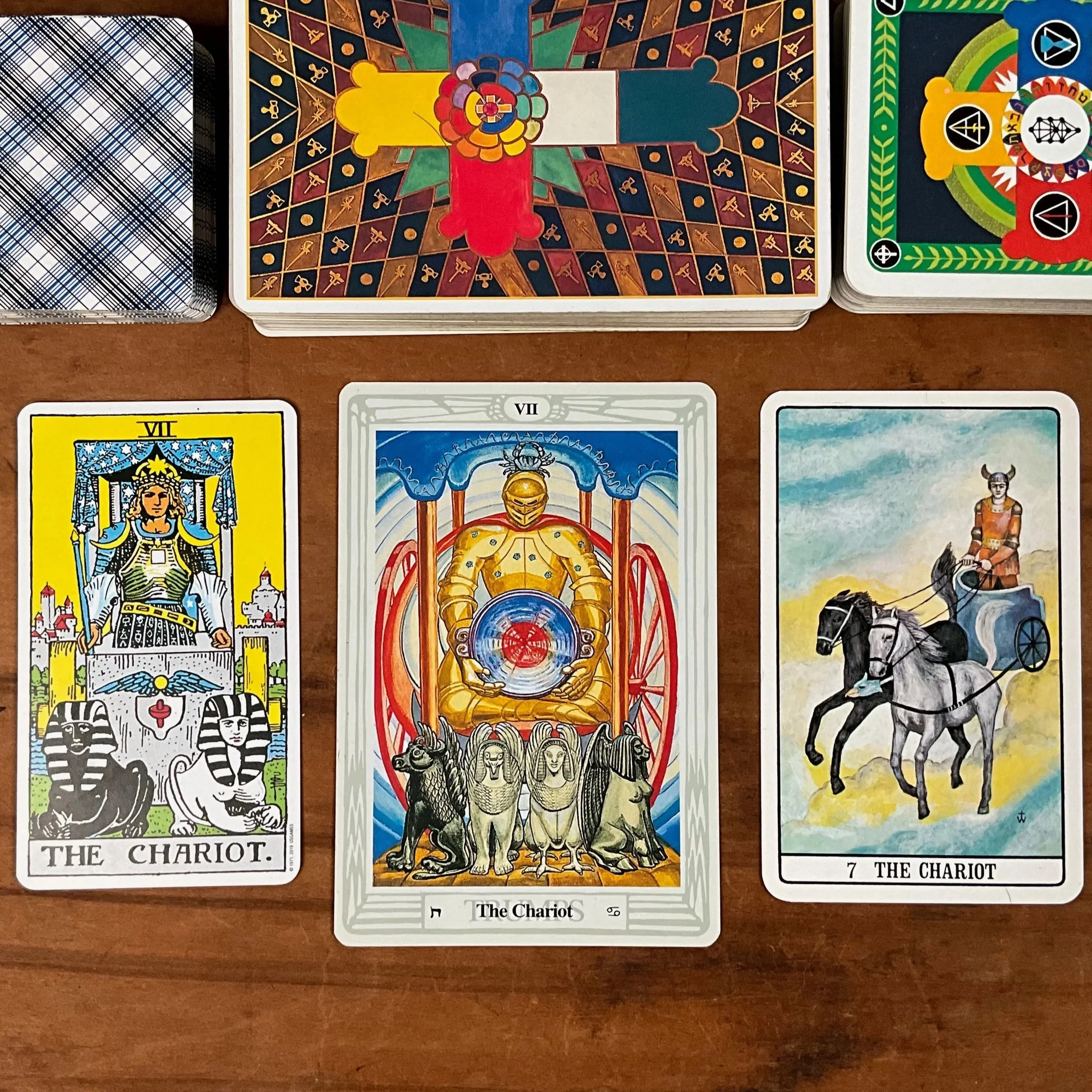 The Chariot tarot cards from the Rider-Waite, Crowley Thoth, and Golden Dawn Tarot