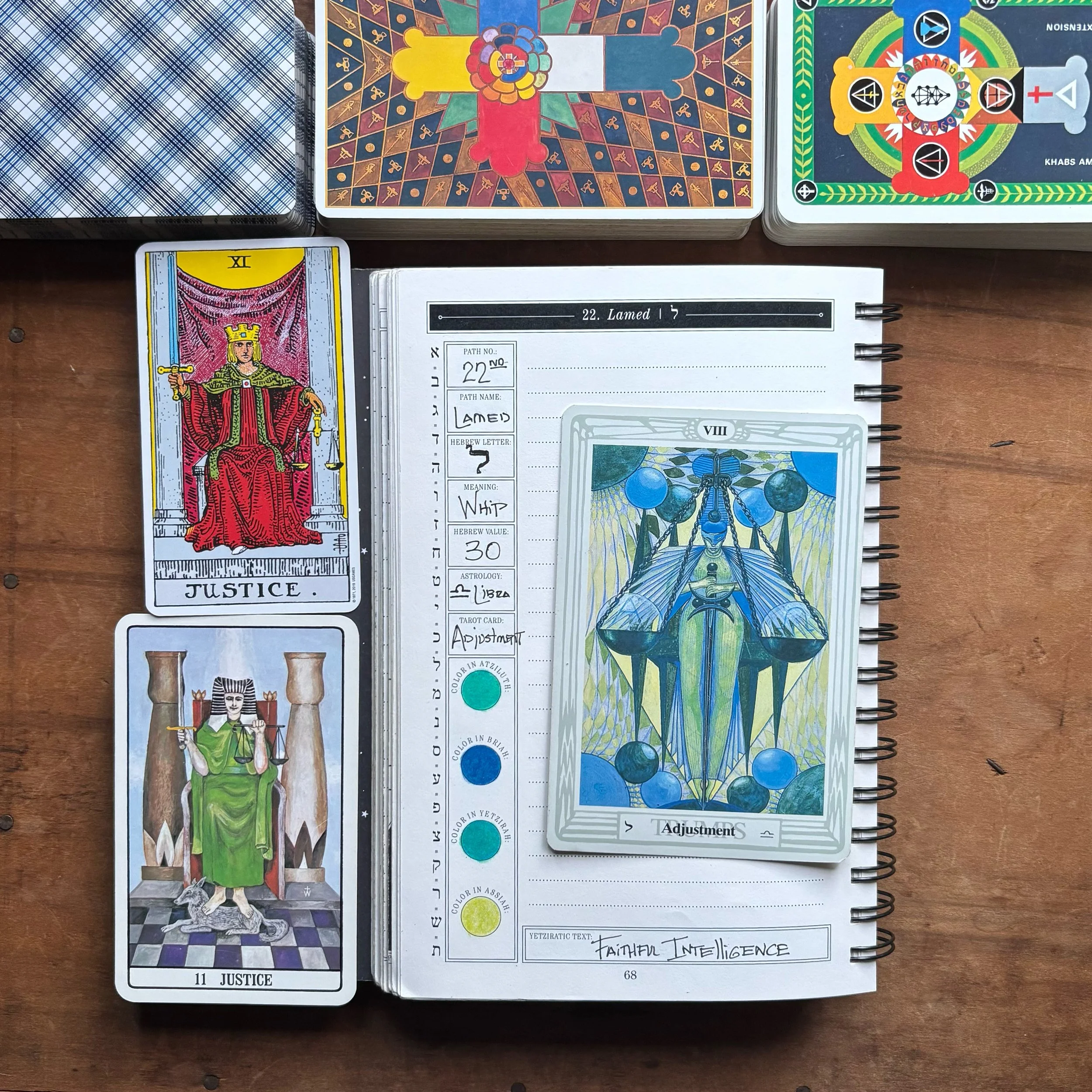 The Great Work Book’s Qabalistic Journal featuring Lamed, the path associated with Libra. The Justice and Adjustment tarot cards from Rider-Waite, Thoth, and Golden Dawn decks are pictured.