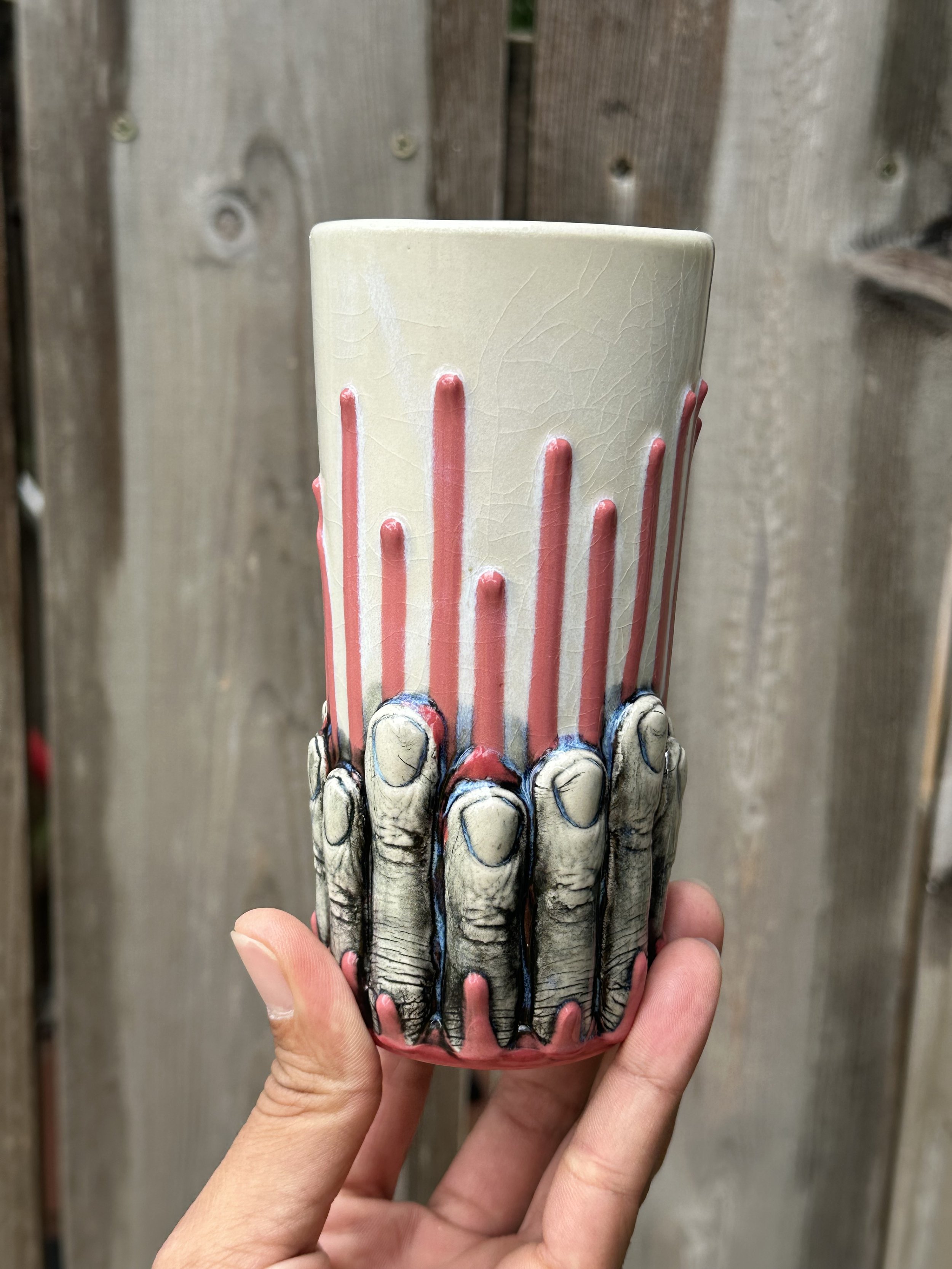 Red finger tumbler