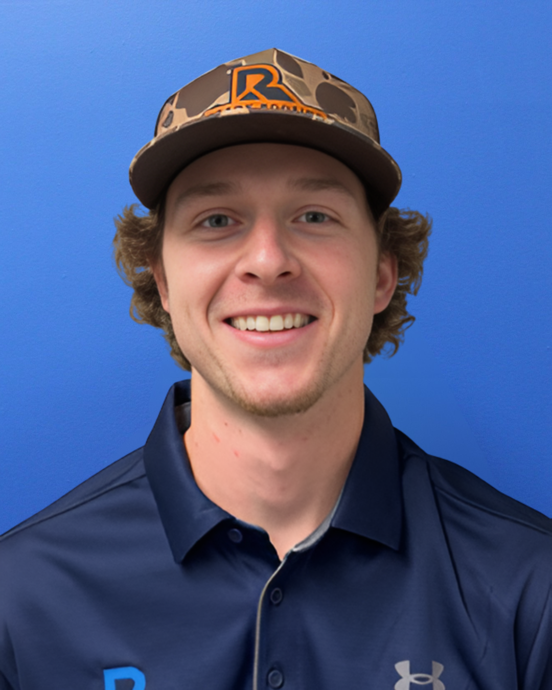 youg man with camoflage hat with Ready Roofing of Georgia logo